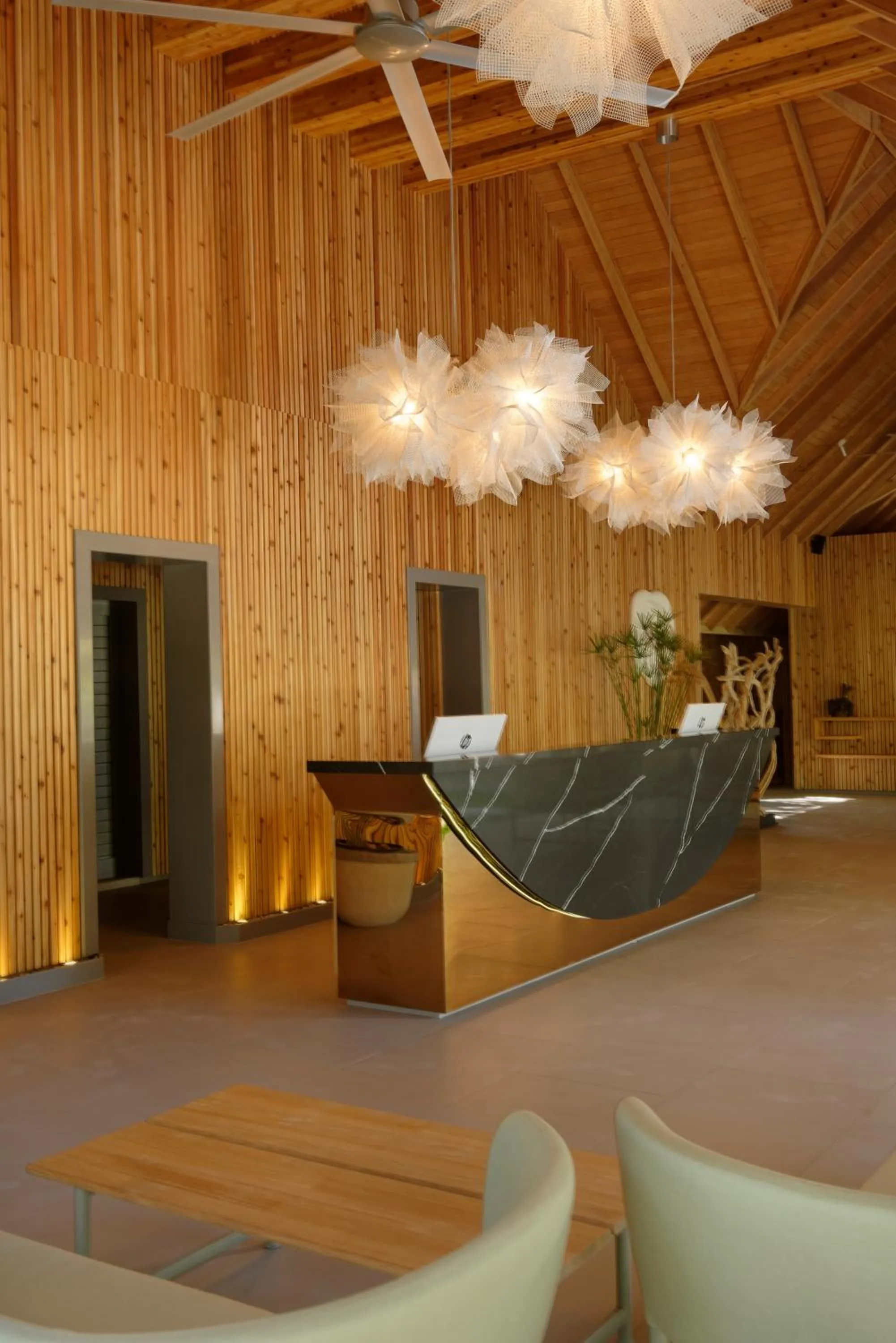 Lobby or reception in OUTRIGGER Maldives Maafushivaru Resort