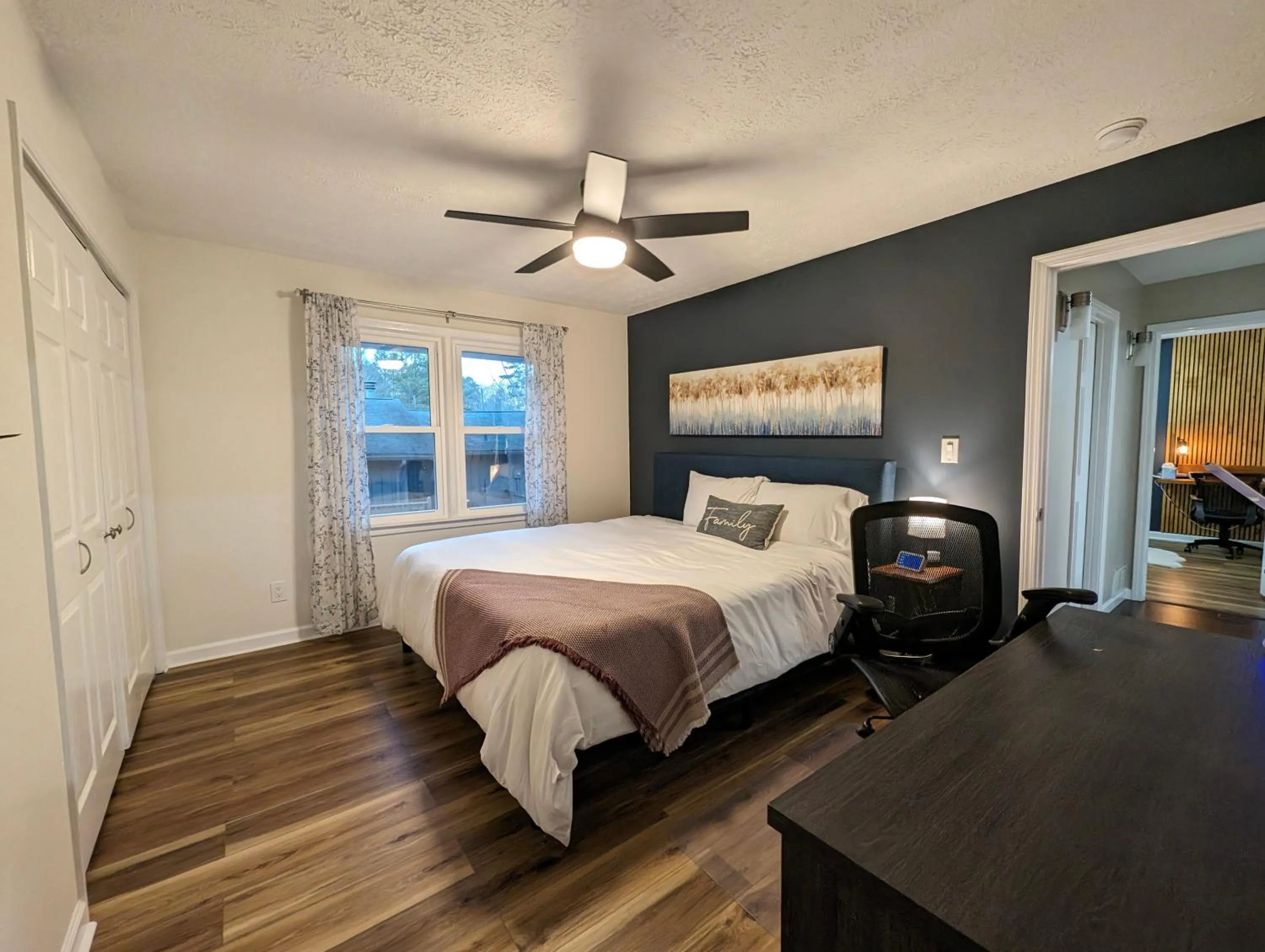 Bed in Modern Luxe Family & Groups Friendly Bungalow with Patio & Workspace