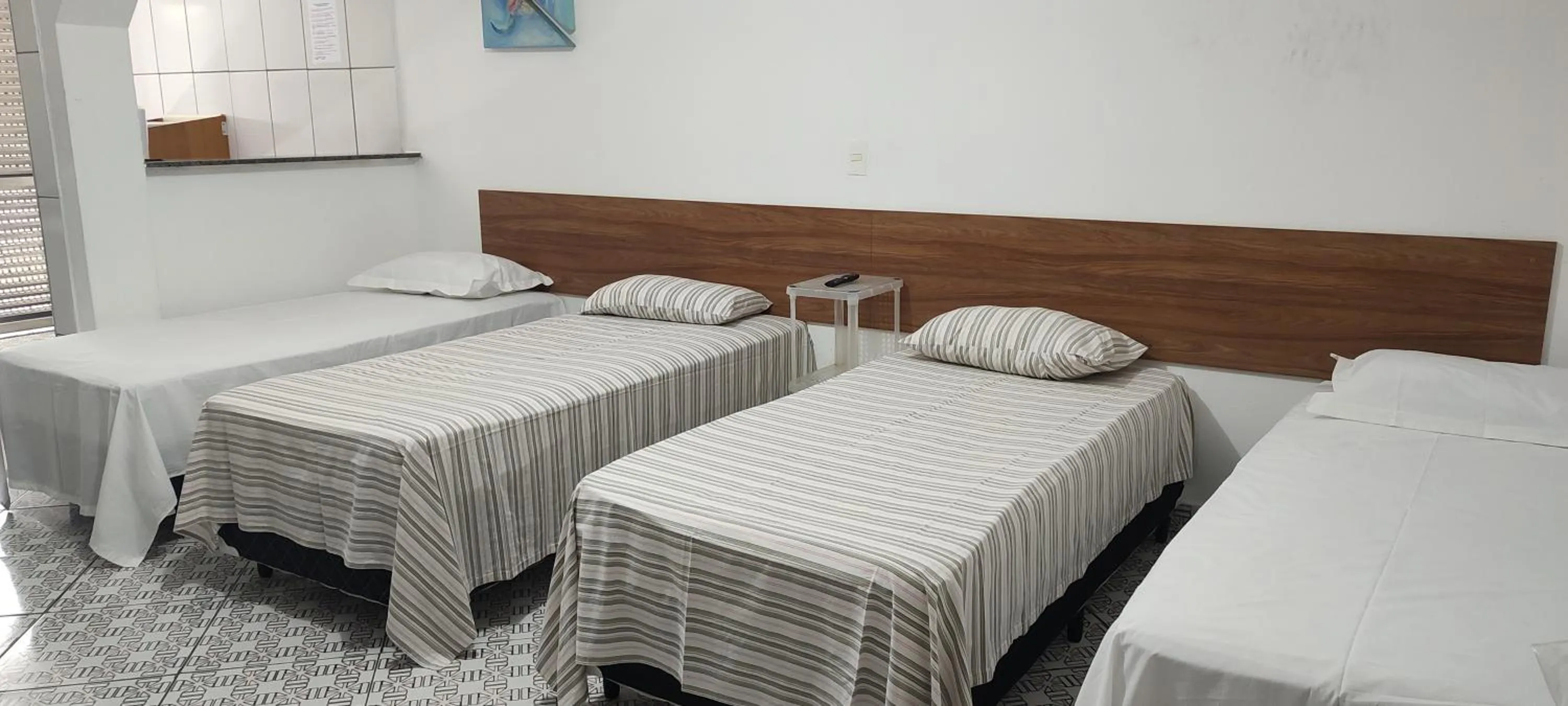 Bed in Pousada Guarulhos