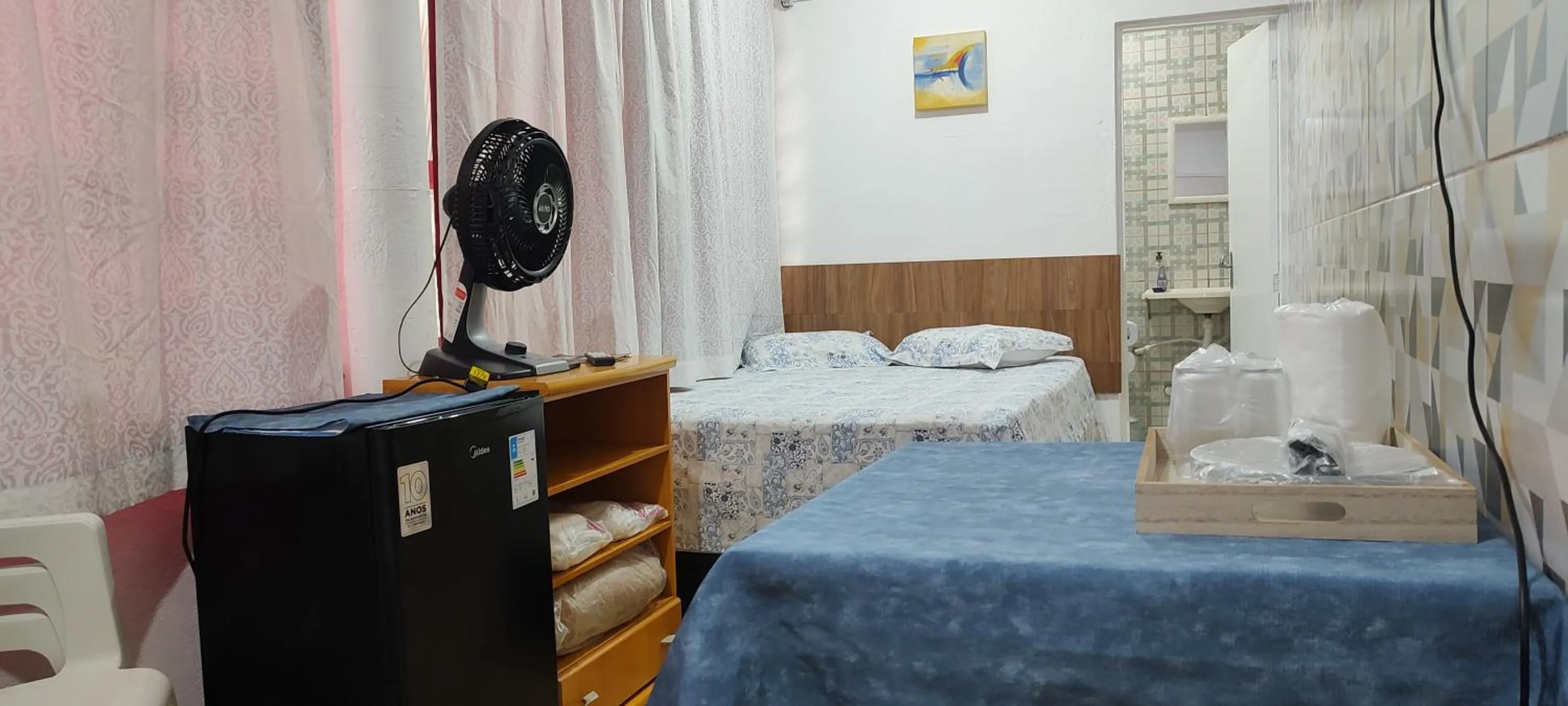 Bed in Pousada Guarulhos