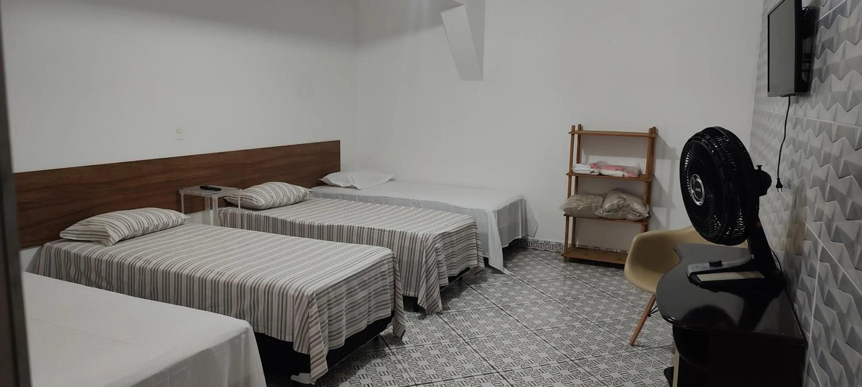 Bed in Pousada Guarulhos