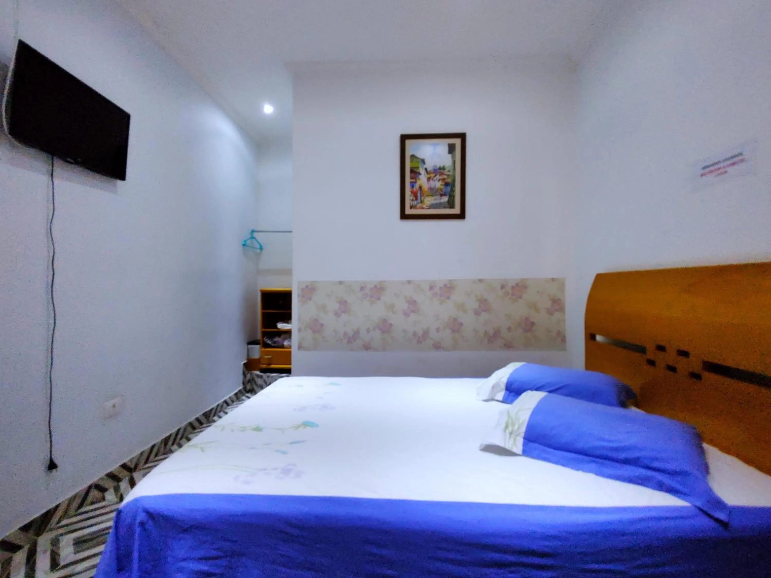 Bed in Pousada Guarulhos