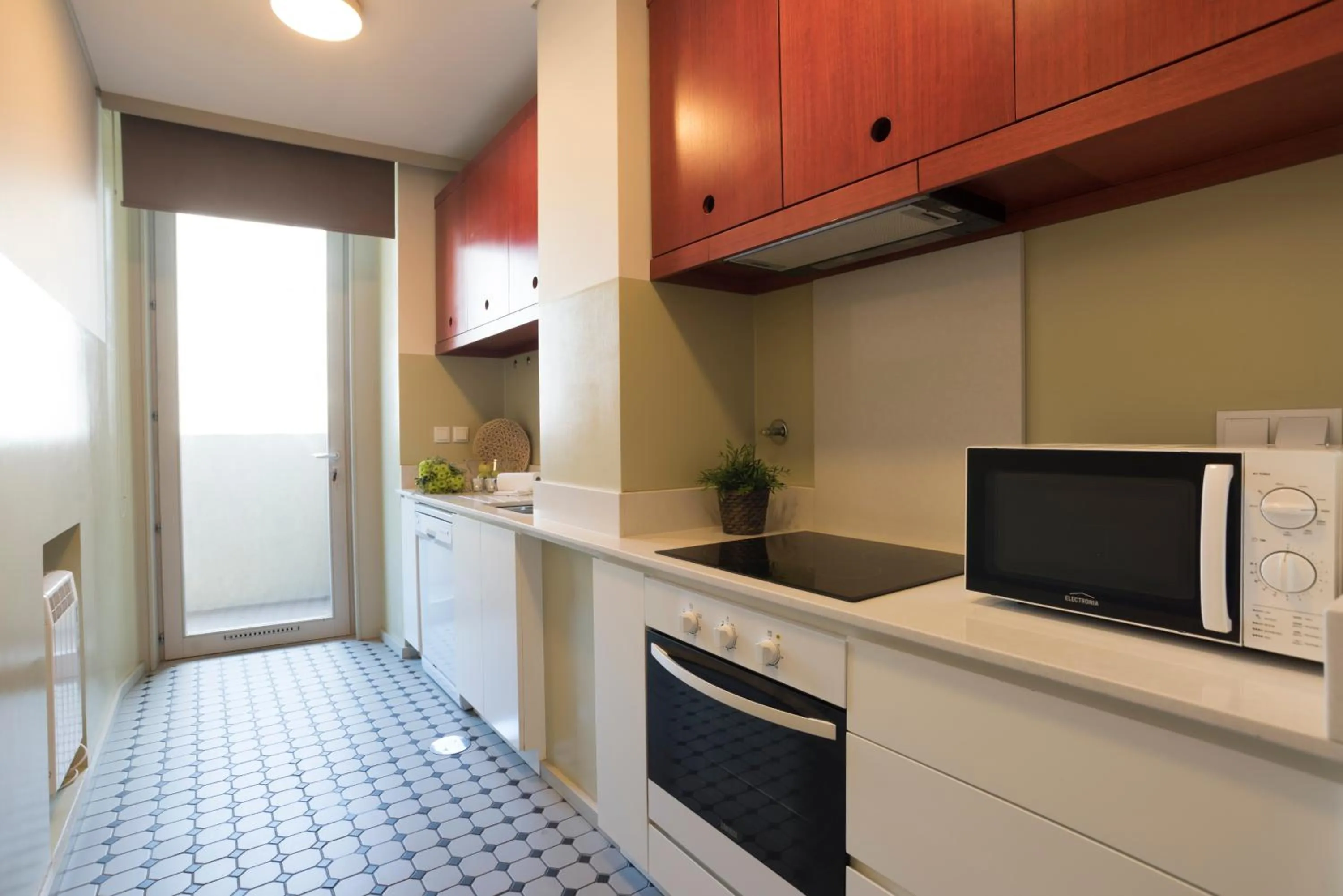 Kitchen or kitchenette in bnapartments Trindade