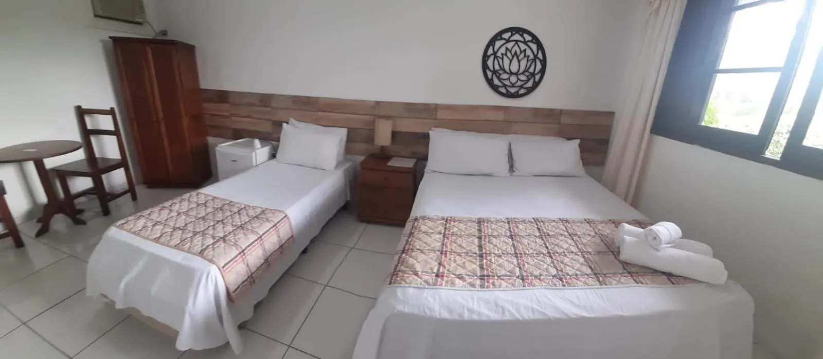 Bed in Pousada Mari