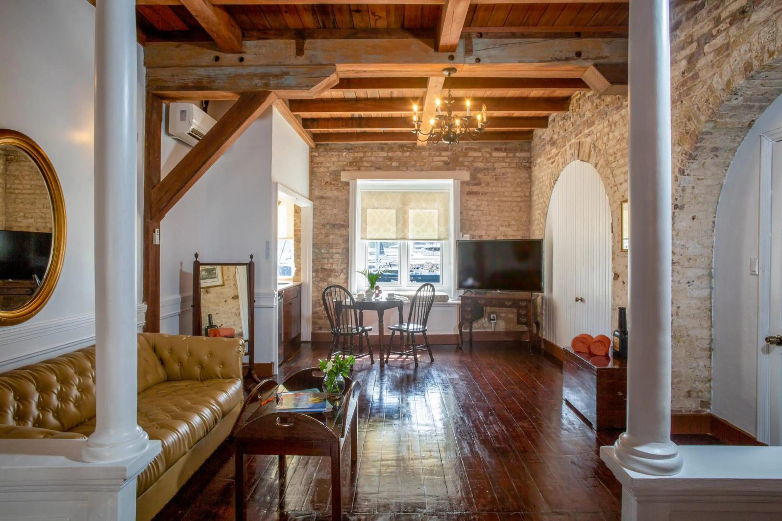 Communal lounge/ TV room in Copper and Lumber Store Hotel