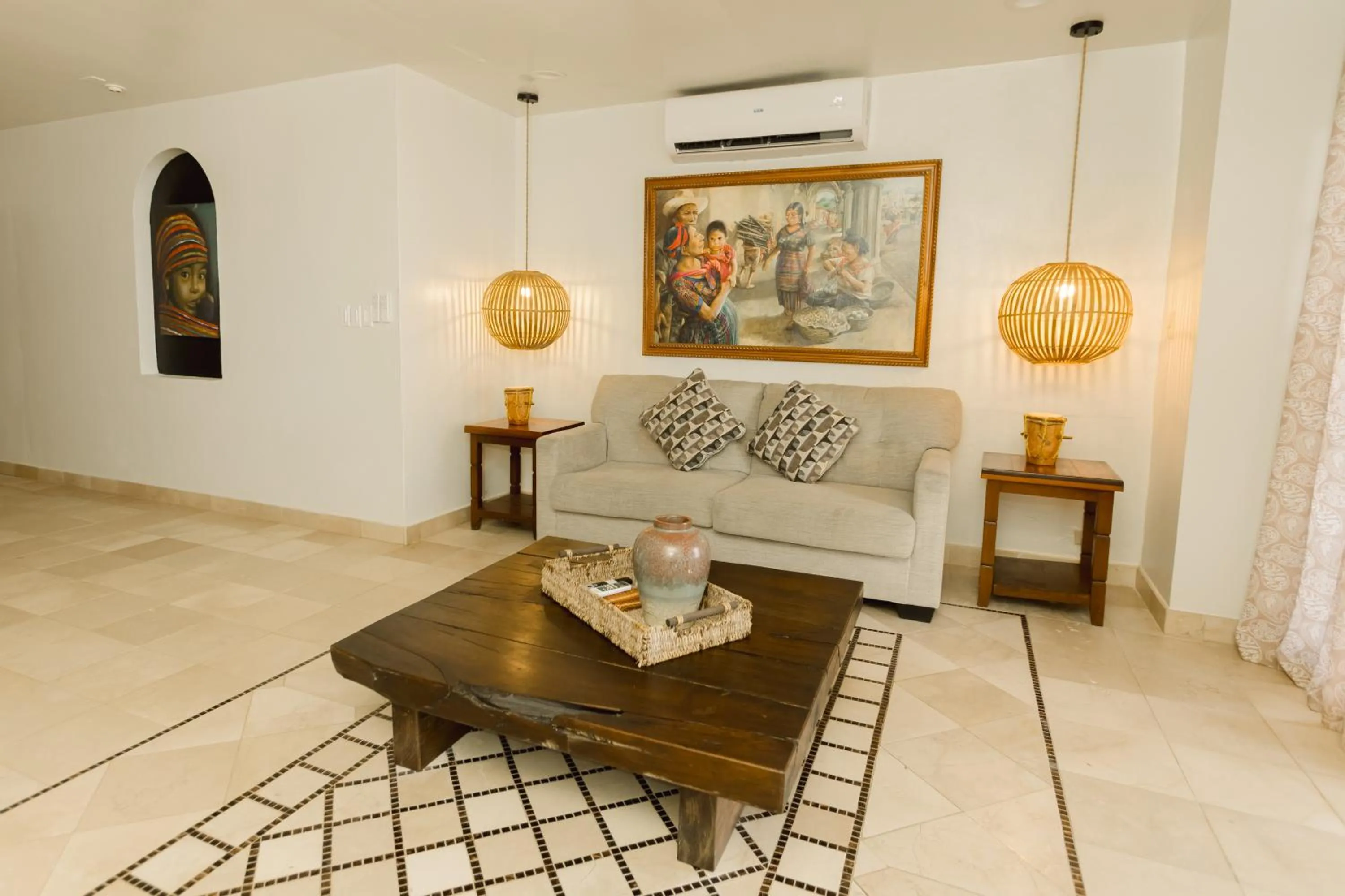 Seating area in Almond Beach Resort at Jaguar Reef