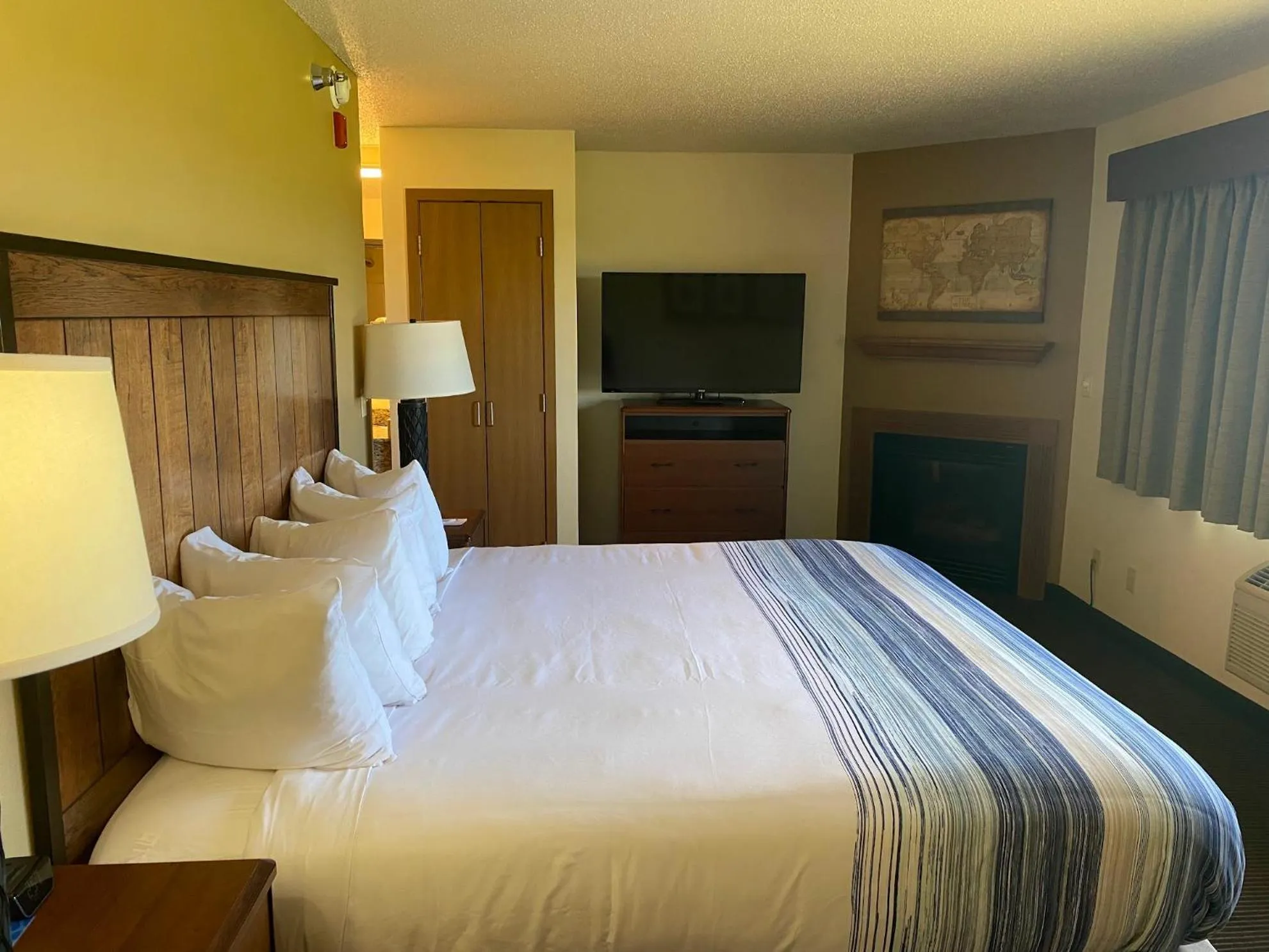 Bed in AmericInn by Wyndham Two Harbors Near Lake Superior