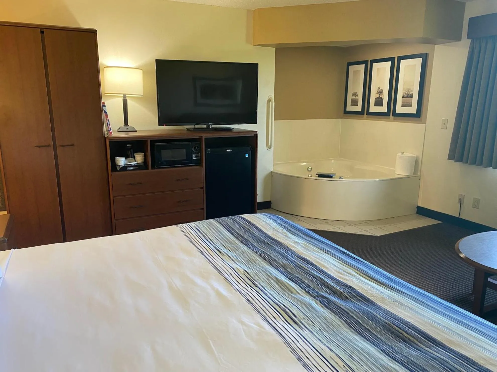 Bed in AmericInn by Wyndham Two Harbors Near Lake Superior