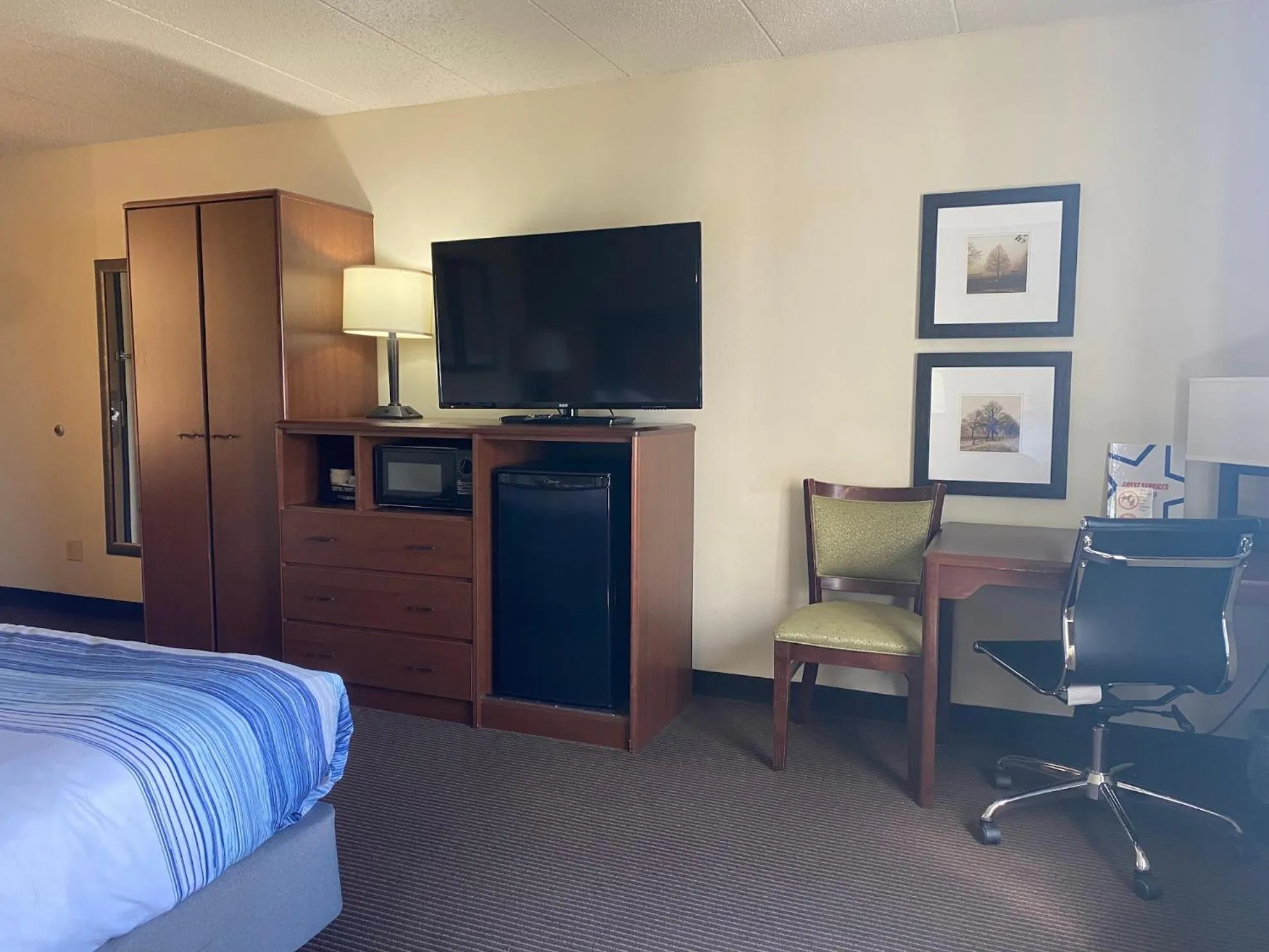 Bed in AmericInn by Wyndham Two Harbors Near Lake Superior