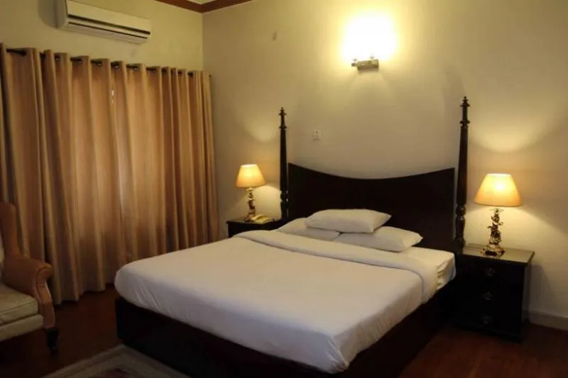 Bed in Paramount Guest House