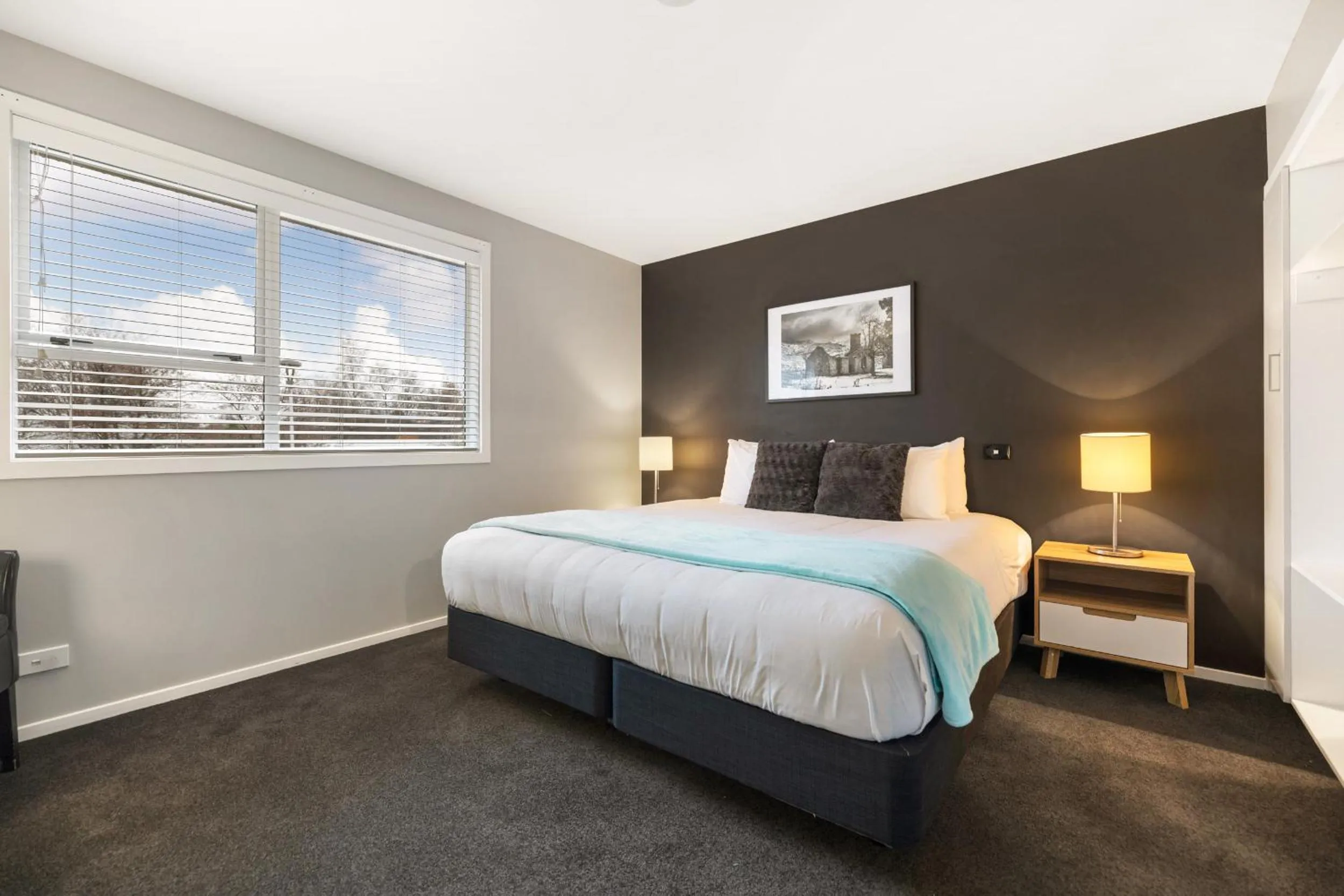 Bed in Arrowtown Motel