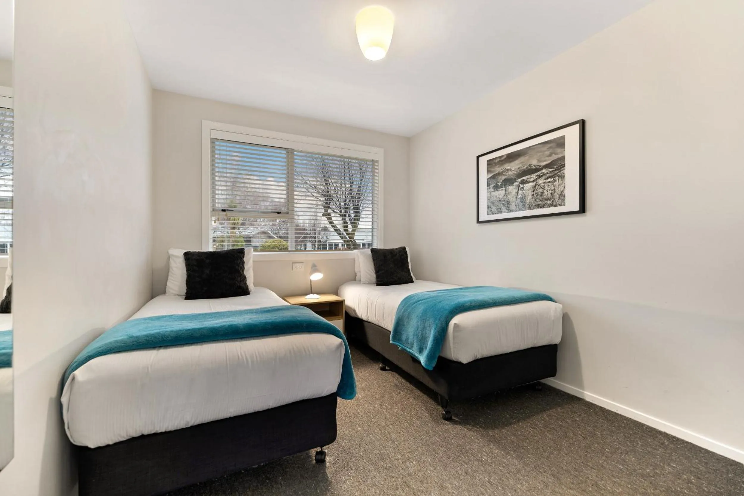 Bed in Arrowtown Motel