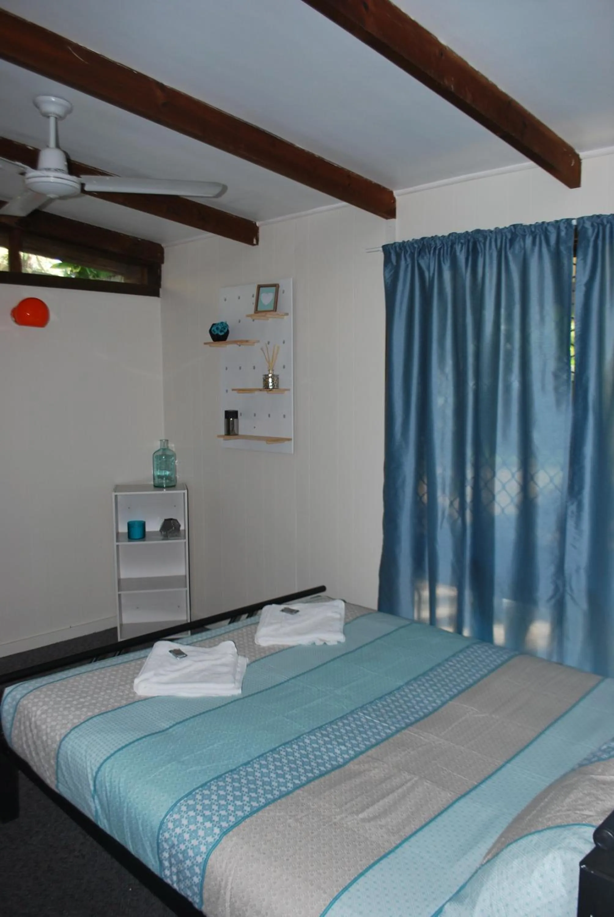 Bed in Colonial Village Resort