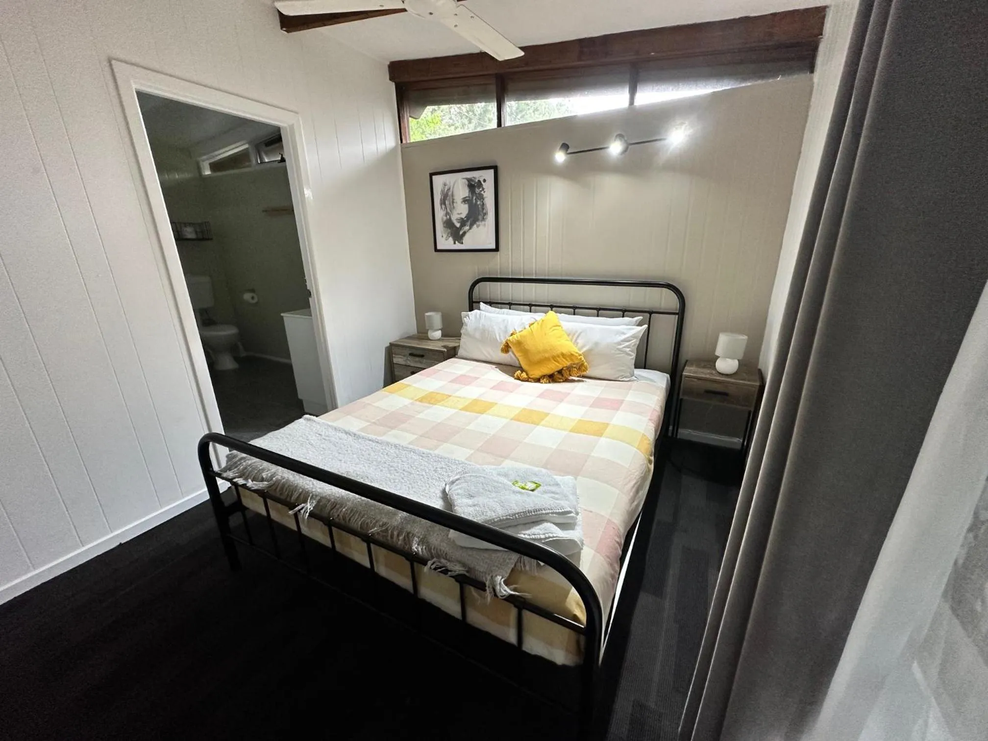 Bed in Colonial Village Resort