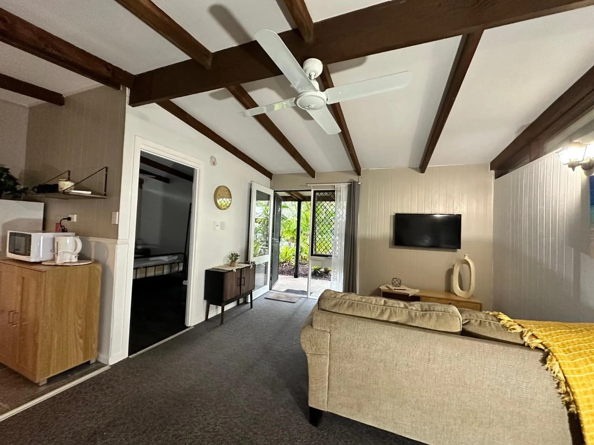 Bed in Colonial Village Resort