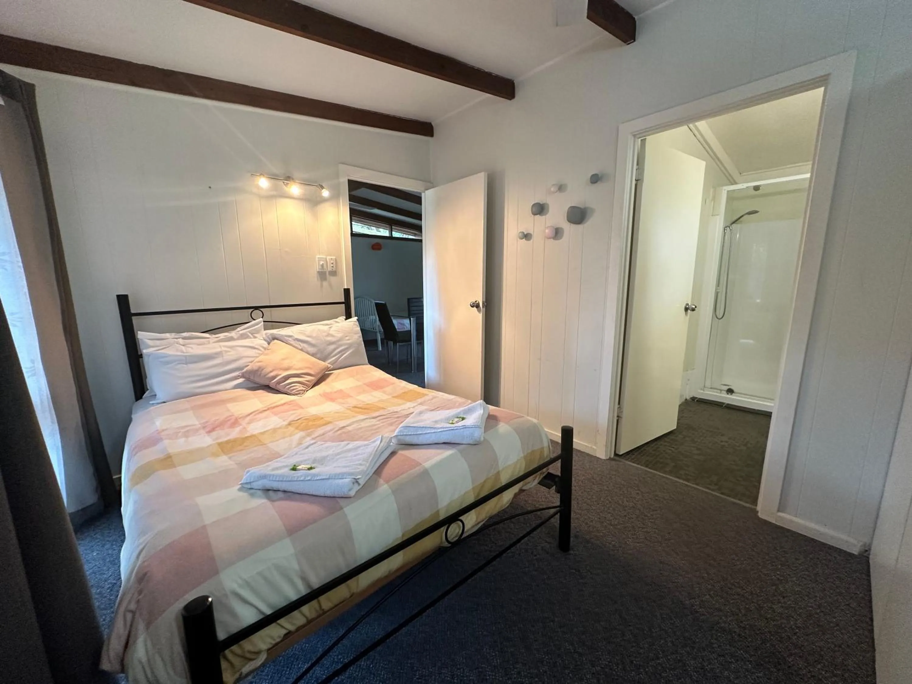 Bed in Colonial Village Resort