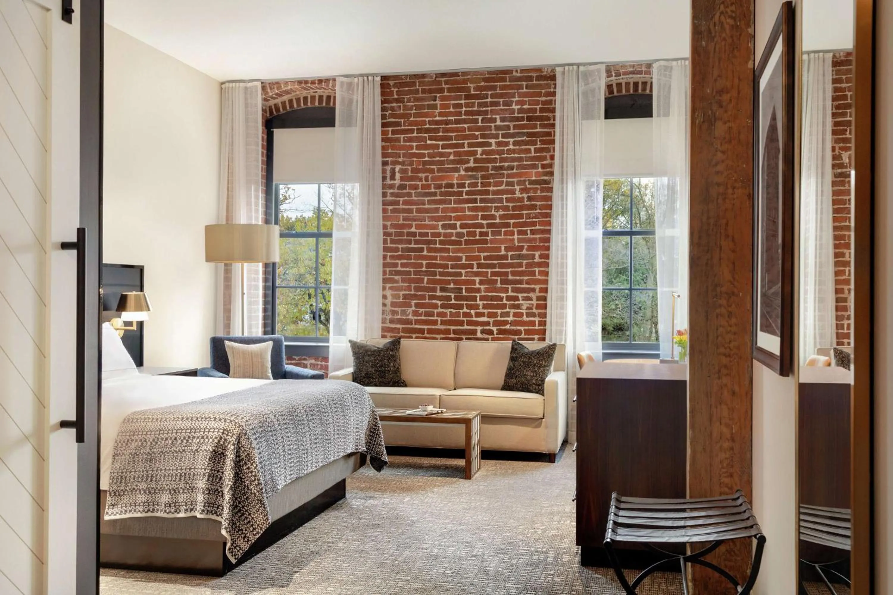 Living room, Bed in The Wilbur Lititz, Tapestry Collection By Hilton