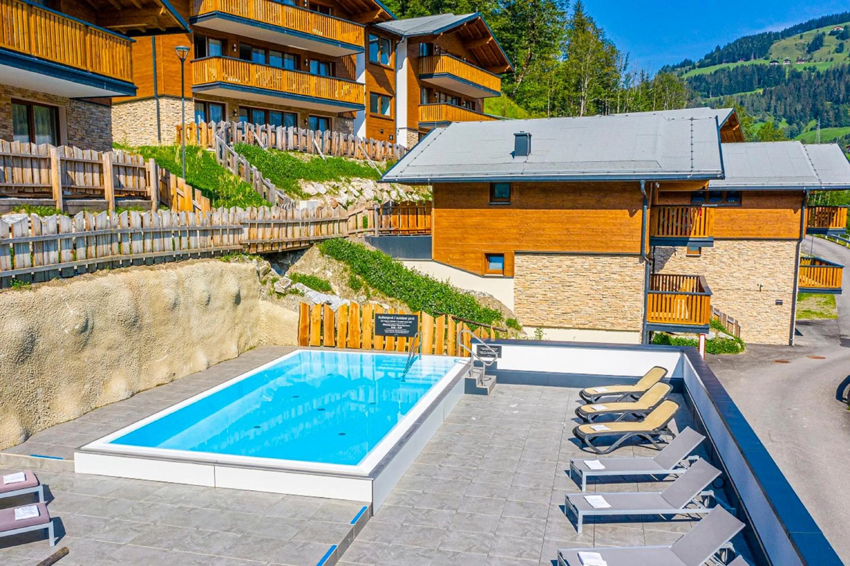 Pool view in Apartment Dorf Wagrain Alpenleben by AlpenTravel