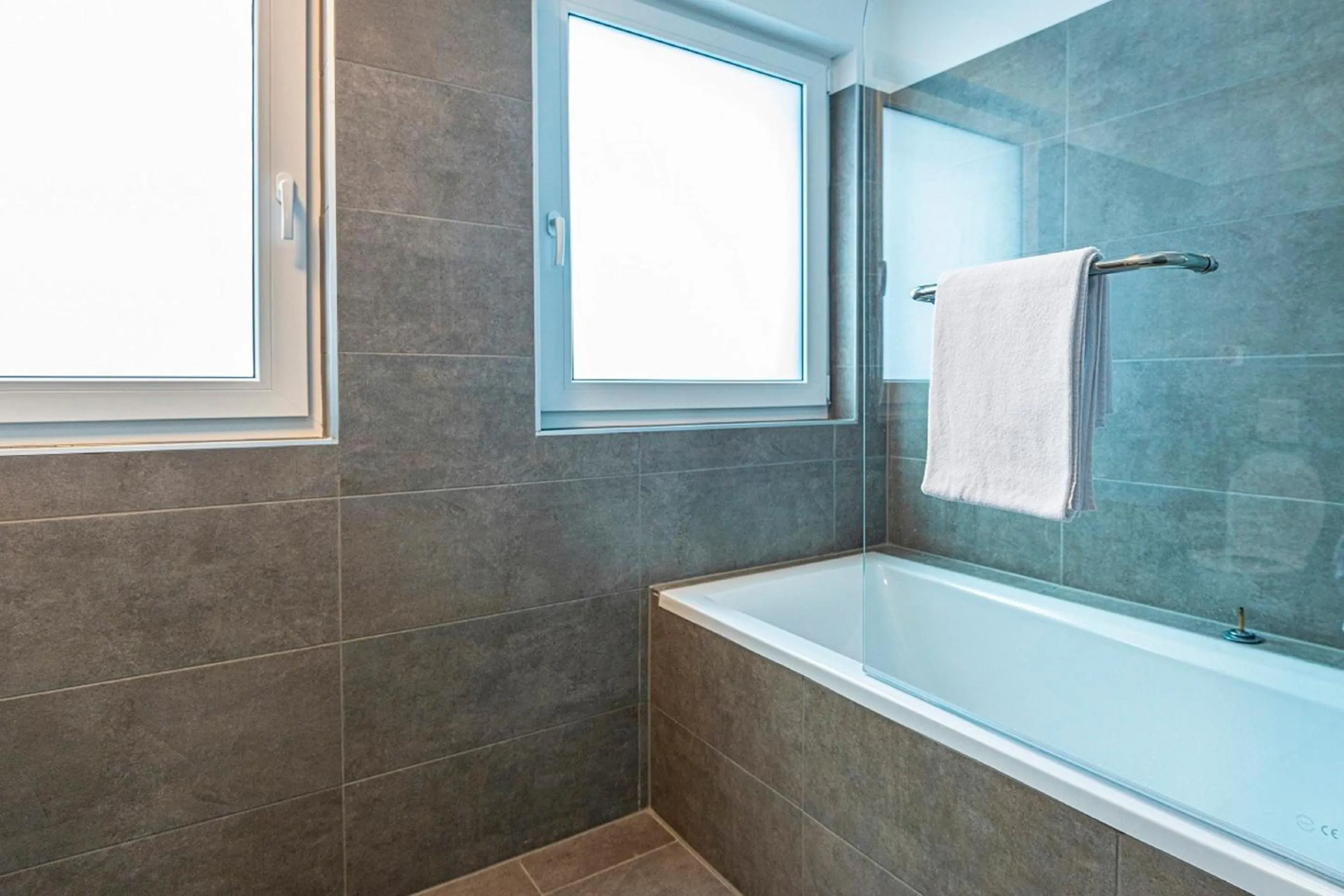 Bathroom in Apartment Dorf Wagrain Alpenleben by AlpenTravel