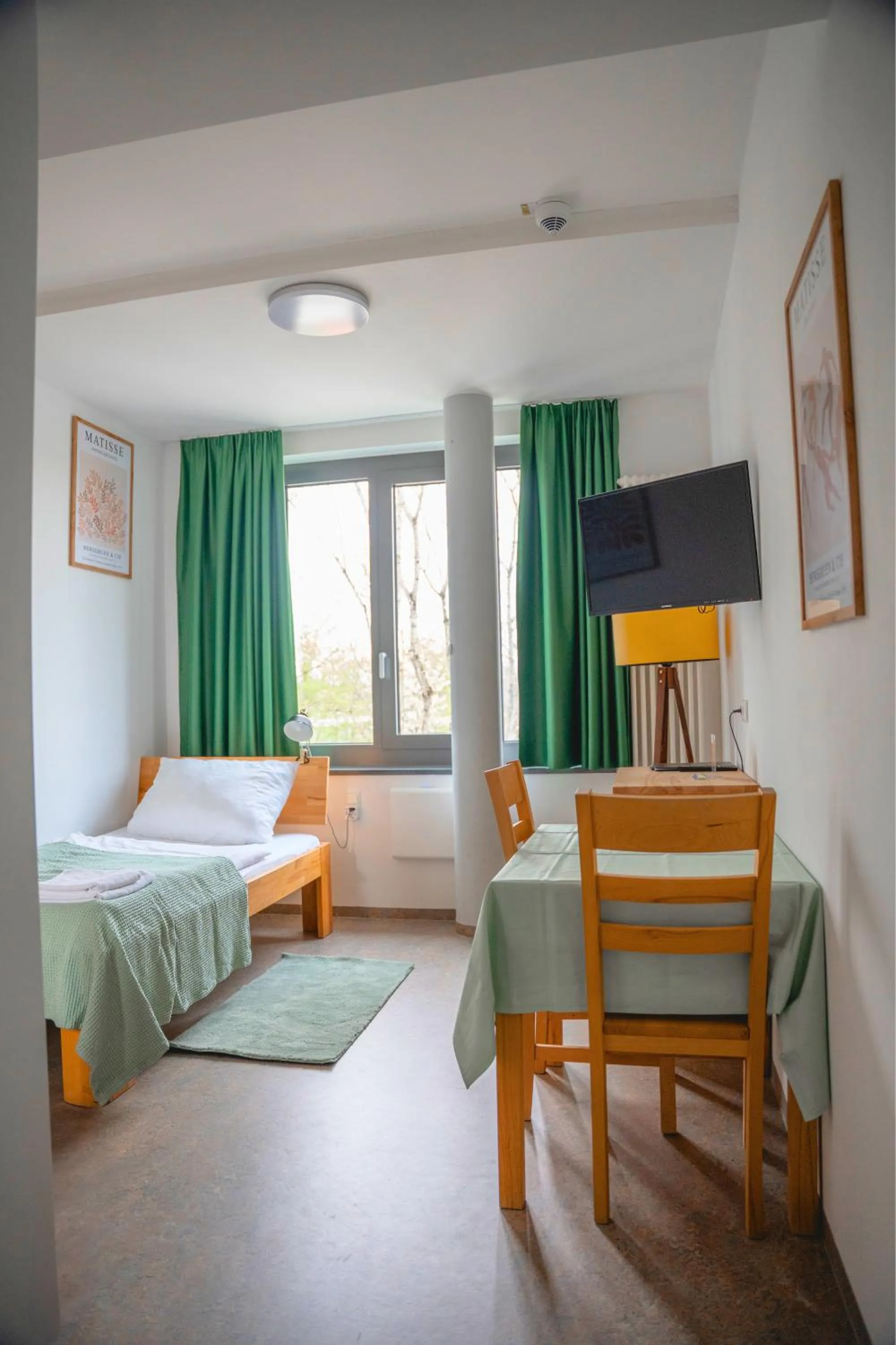 Bed in Hotel Garni Fischerfleck in Ismaning near Munich