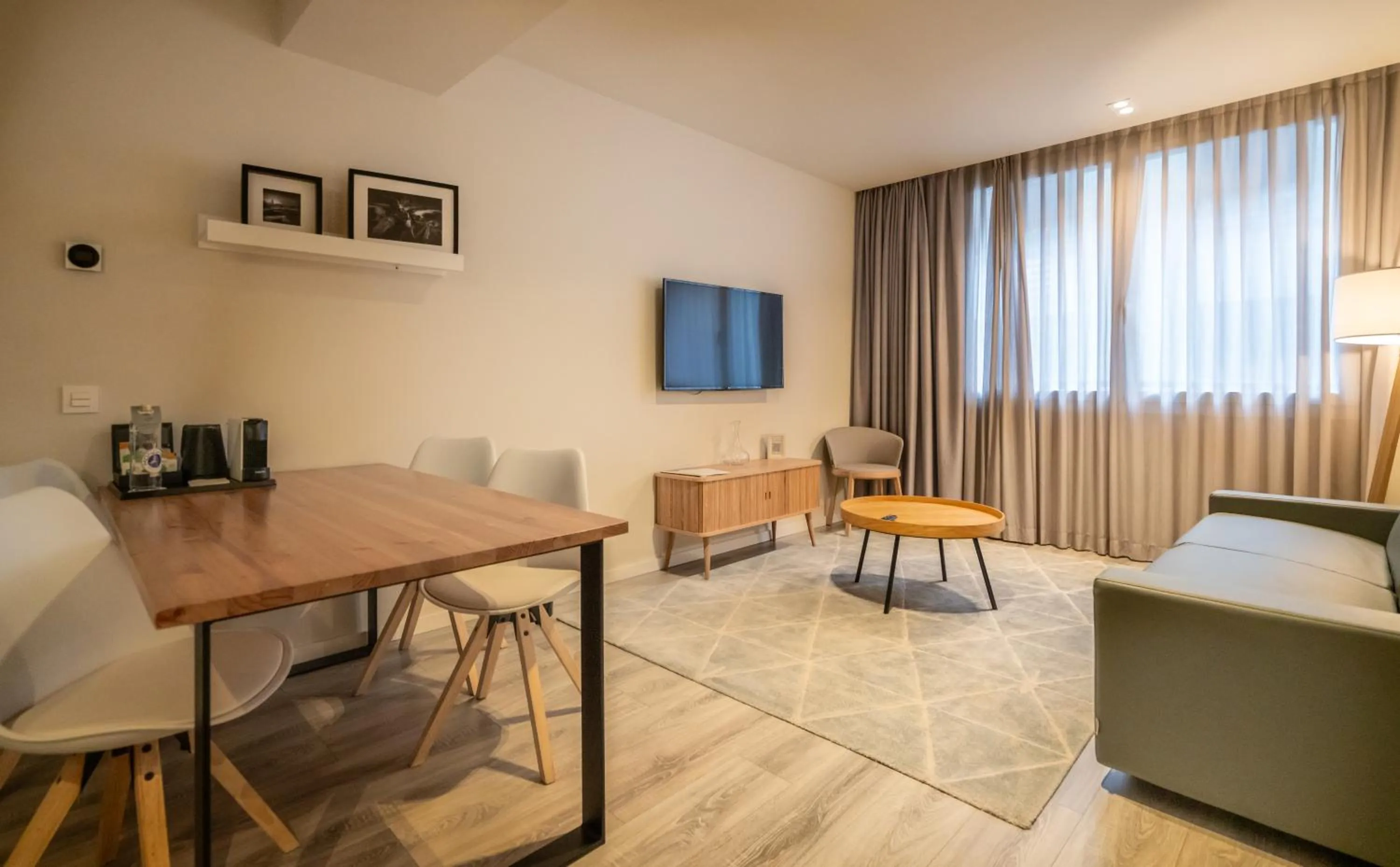 Living room in Bilbao City Center by abba Suites