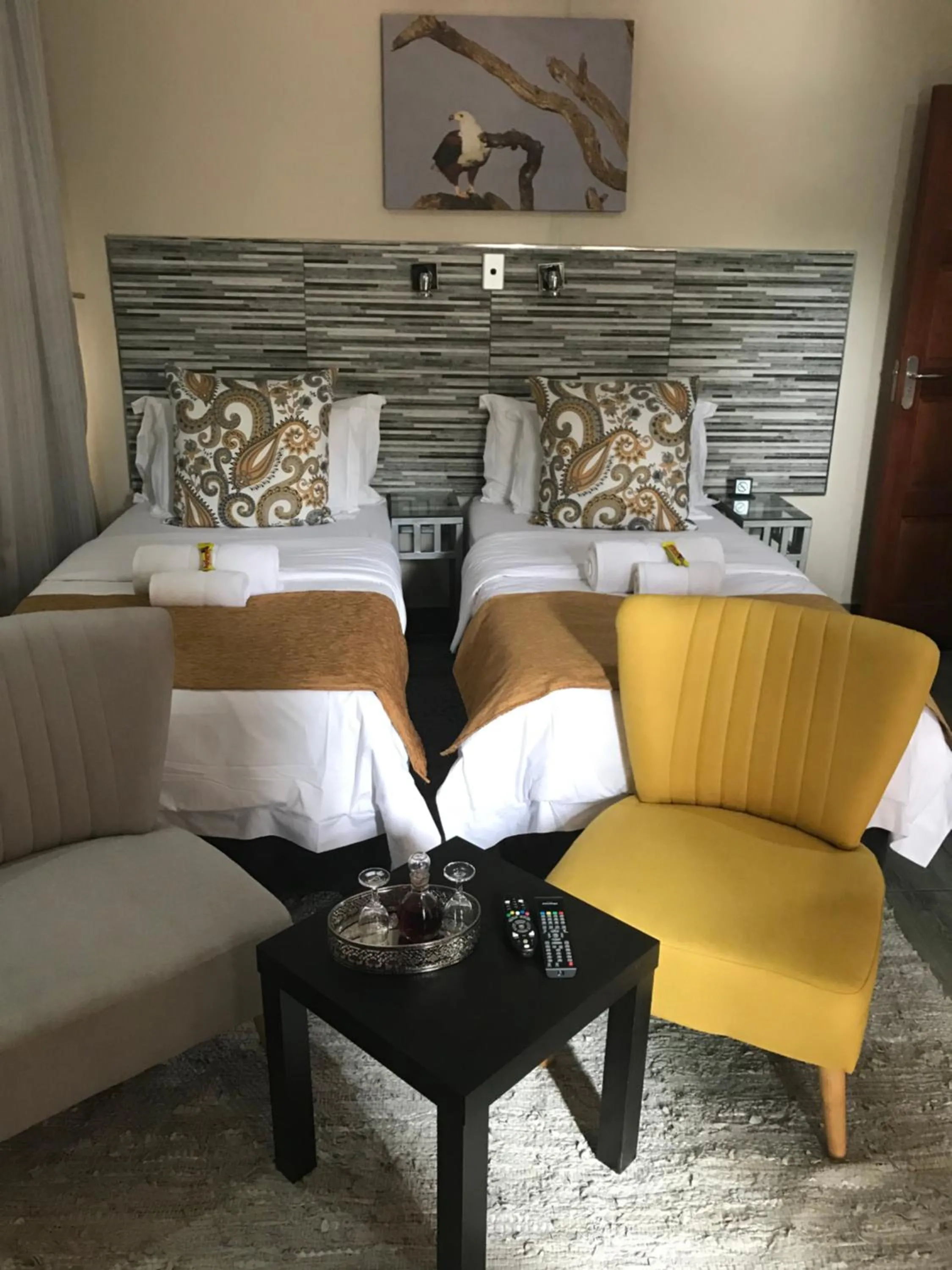 Bed in Ecolux Boutique Hotel