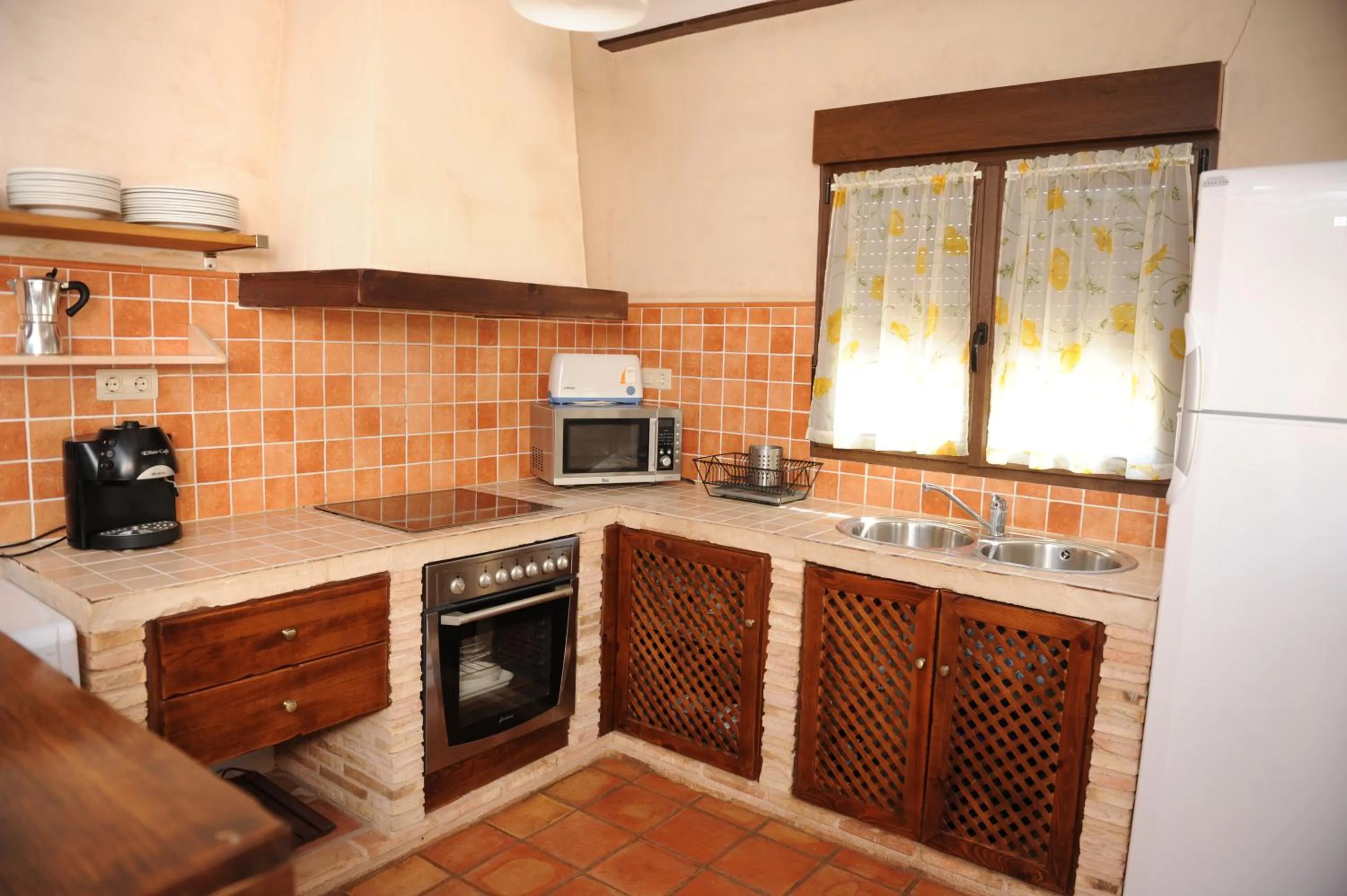 Kitchen or kitchenette in Casas Rurales Cortijo Bellavista