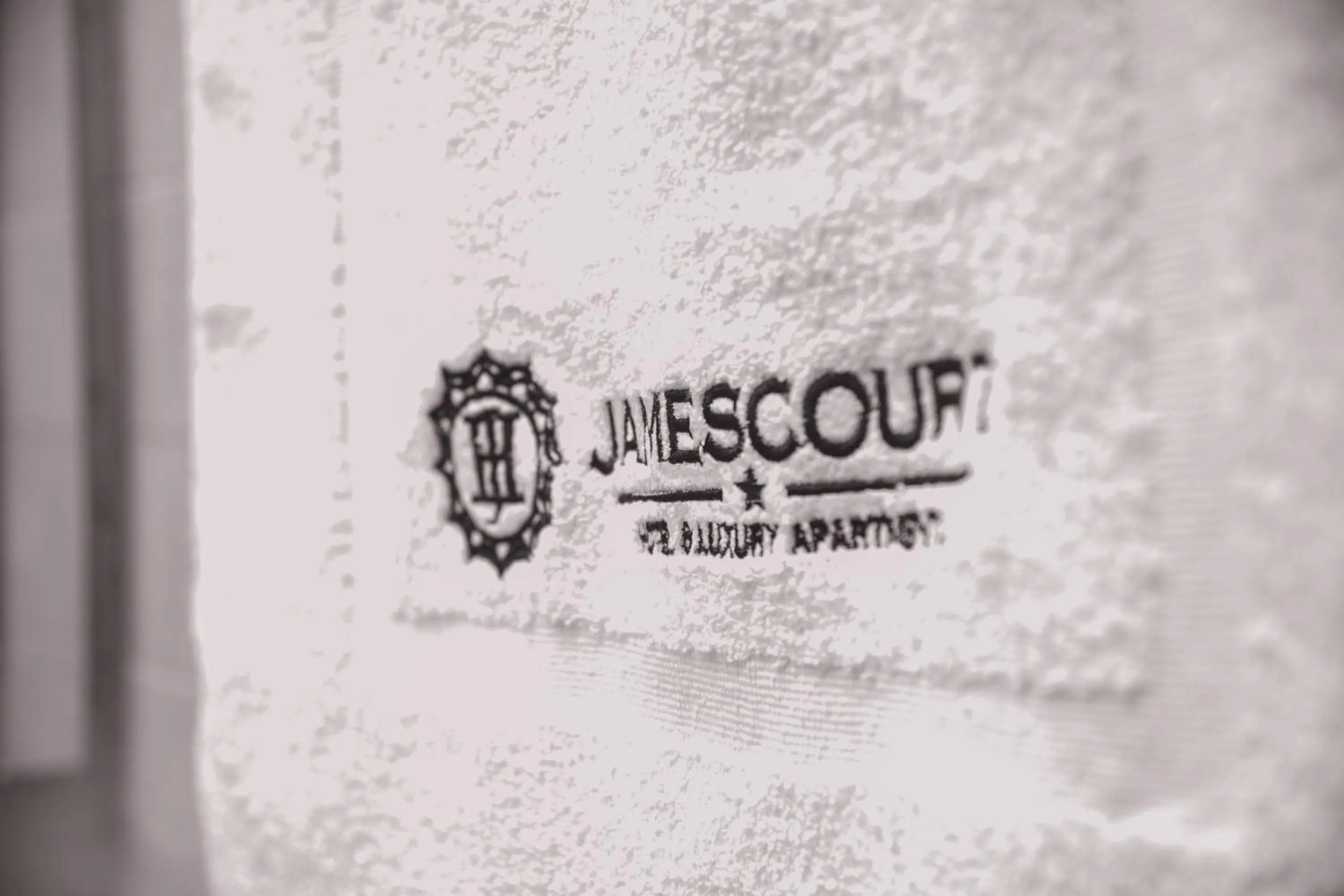 Property logo or sign in James Court Hotel & Luxury Apartments