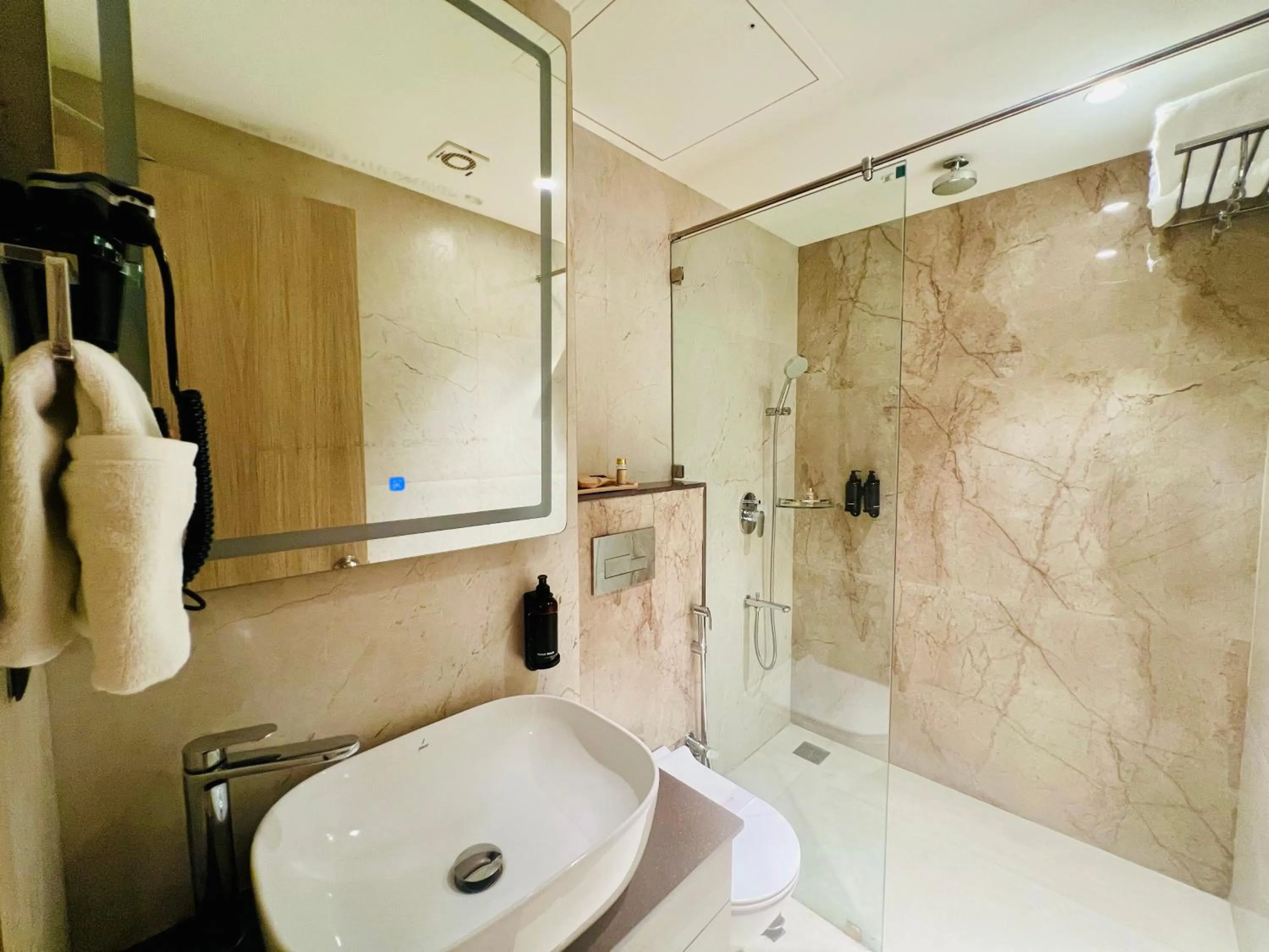 Bedroom in Hyphen Business Hotel