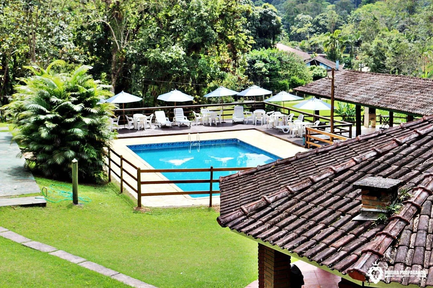 Swimming pool in Eco Chalés Luar das Marés