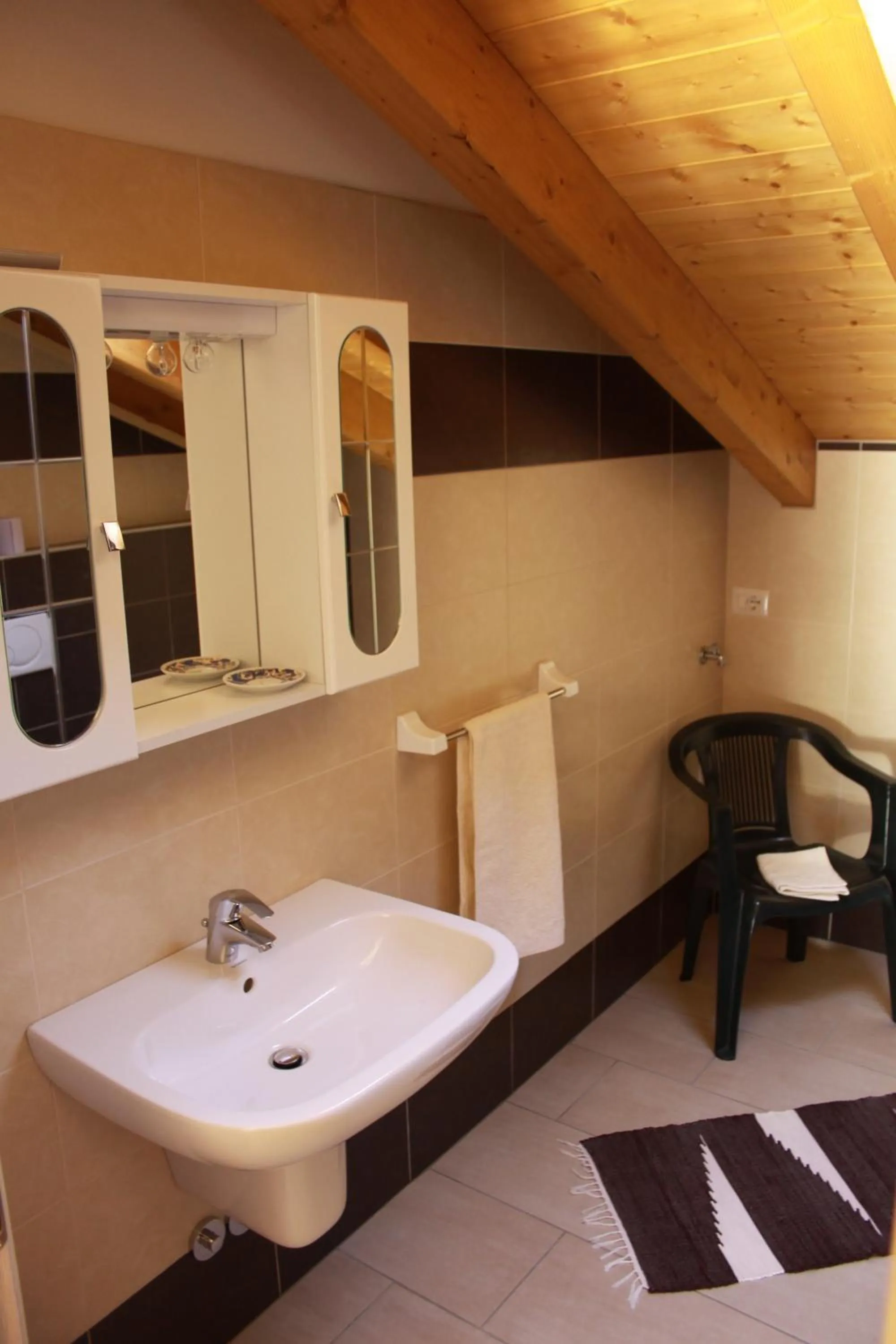 Bathroom in Residence Le Azalee & SPA