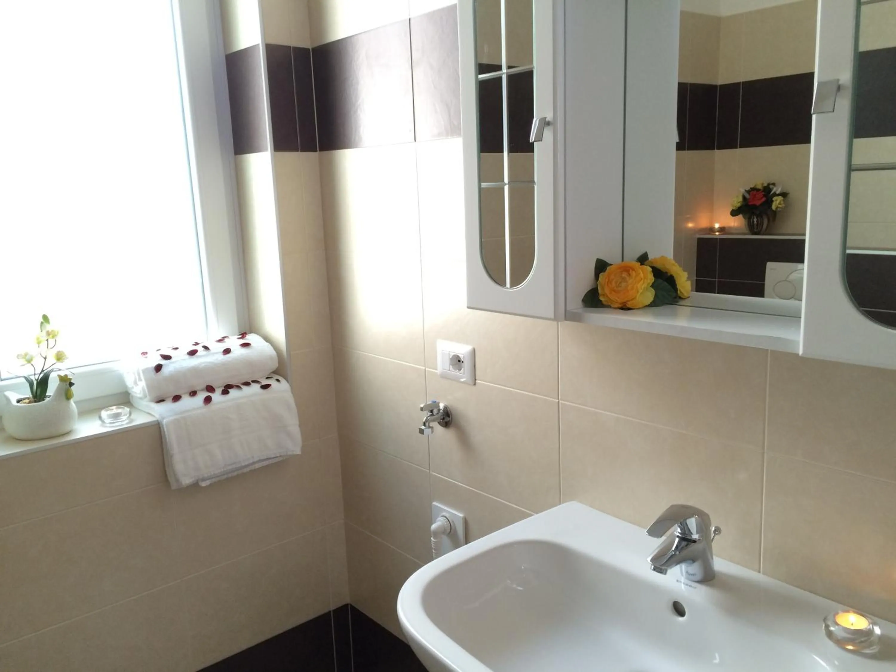 Bathroom in Residence Le Azalee & SPA