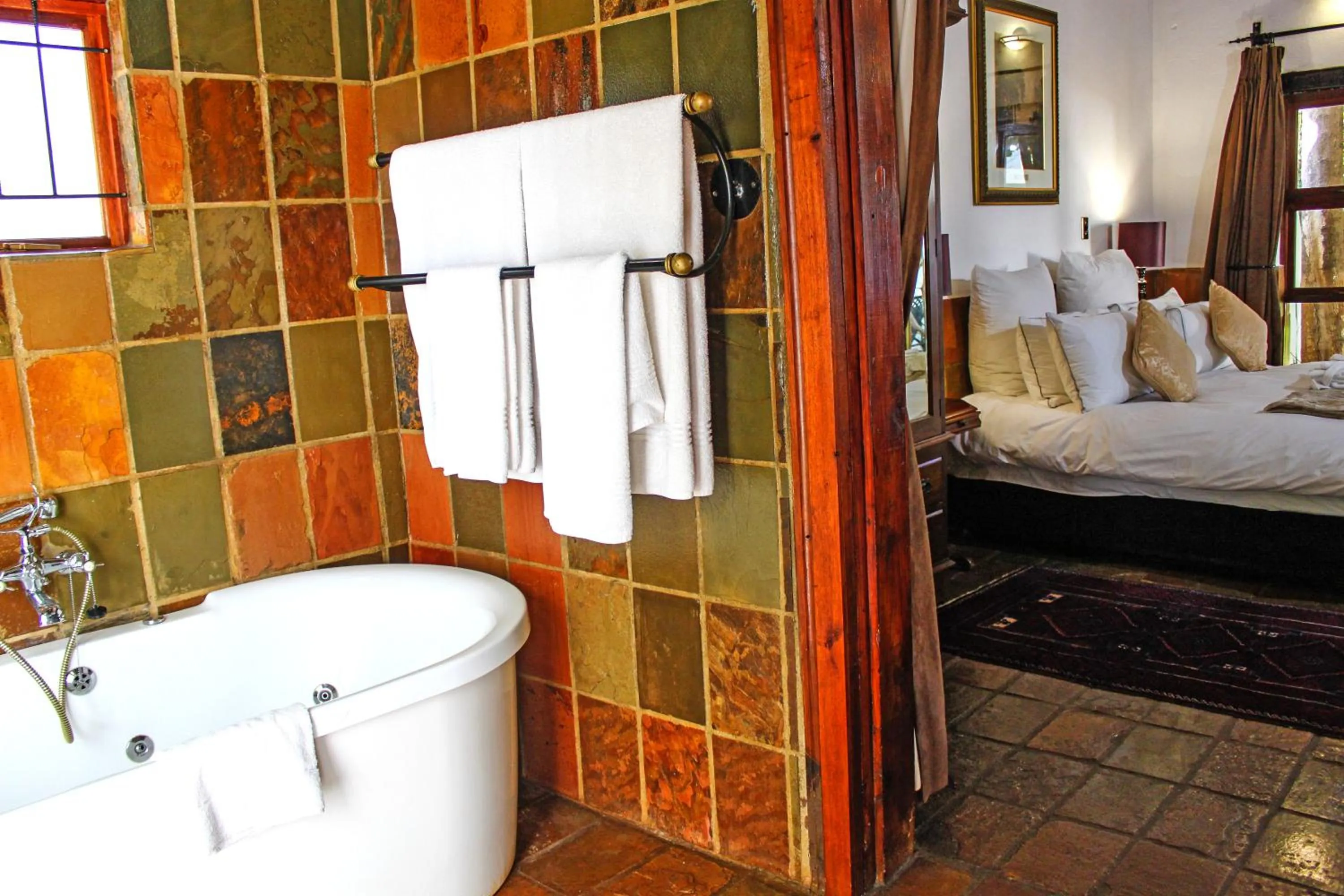 Bathroom, Bed in Kedar Heritage Lodge, Conference Centre & Spa