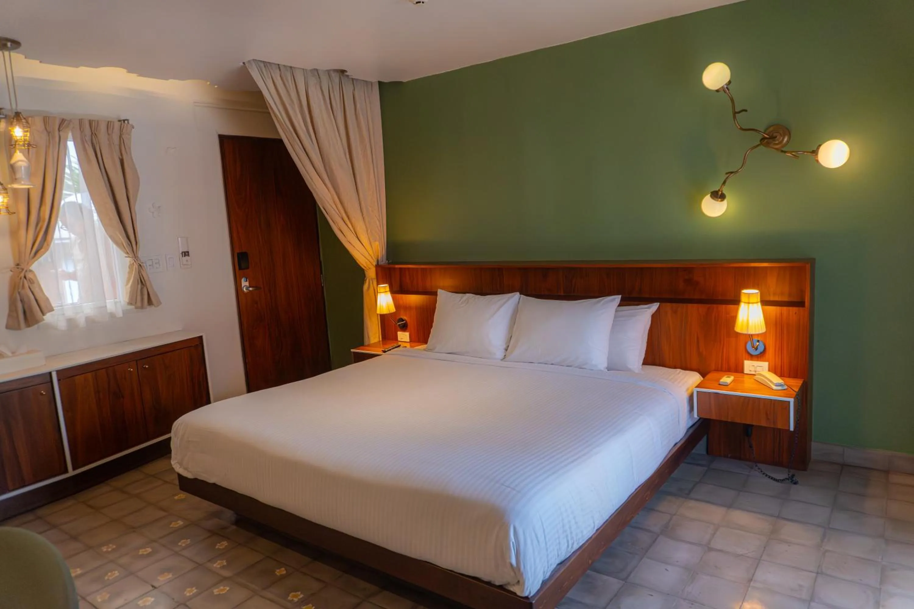 Bed in Flor de Mayo Hotel & Restaurant