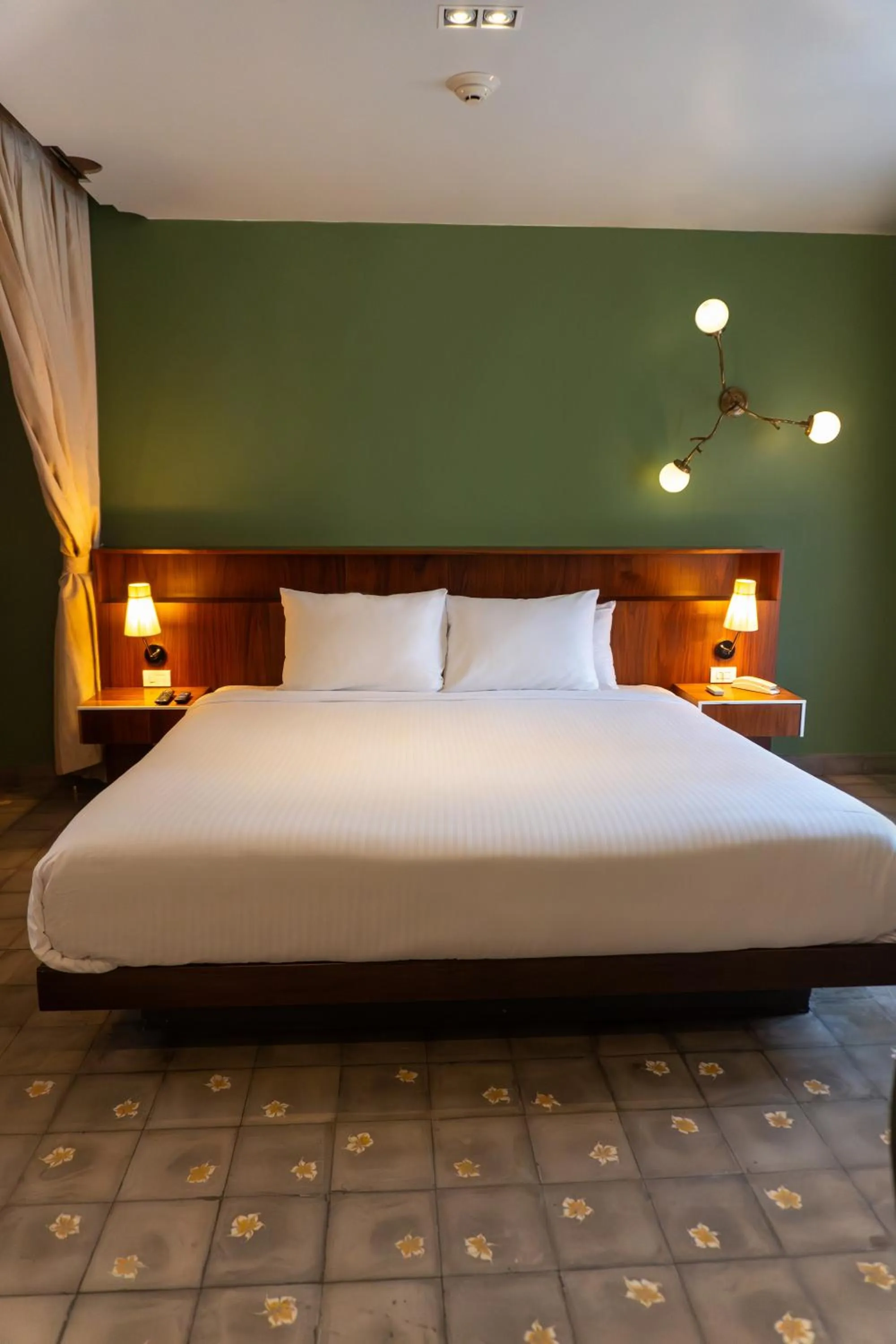Bed in Flor de Mayo Hotel & Restaurant