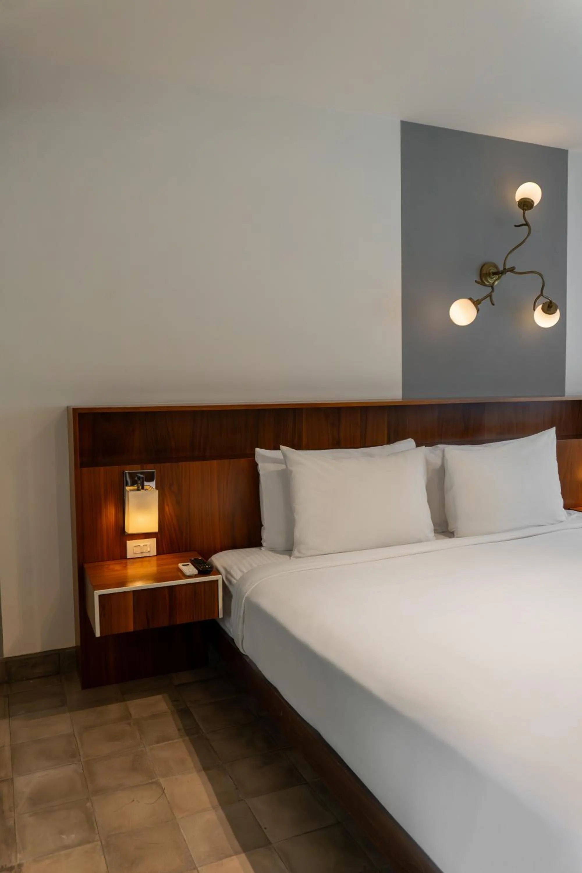 Bed in Flor de Mayo Hotel & Restaurant