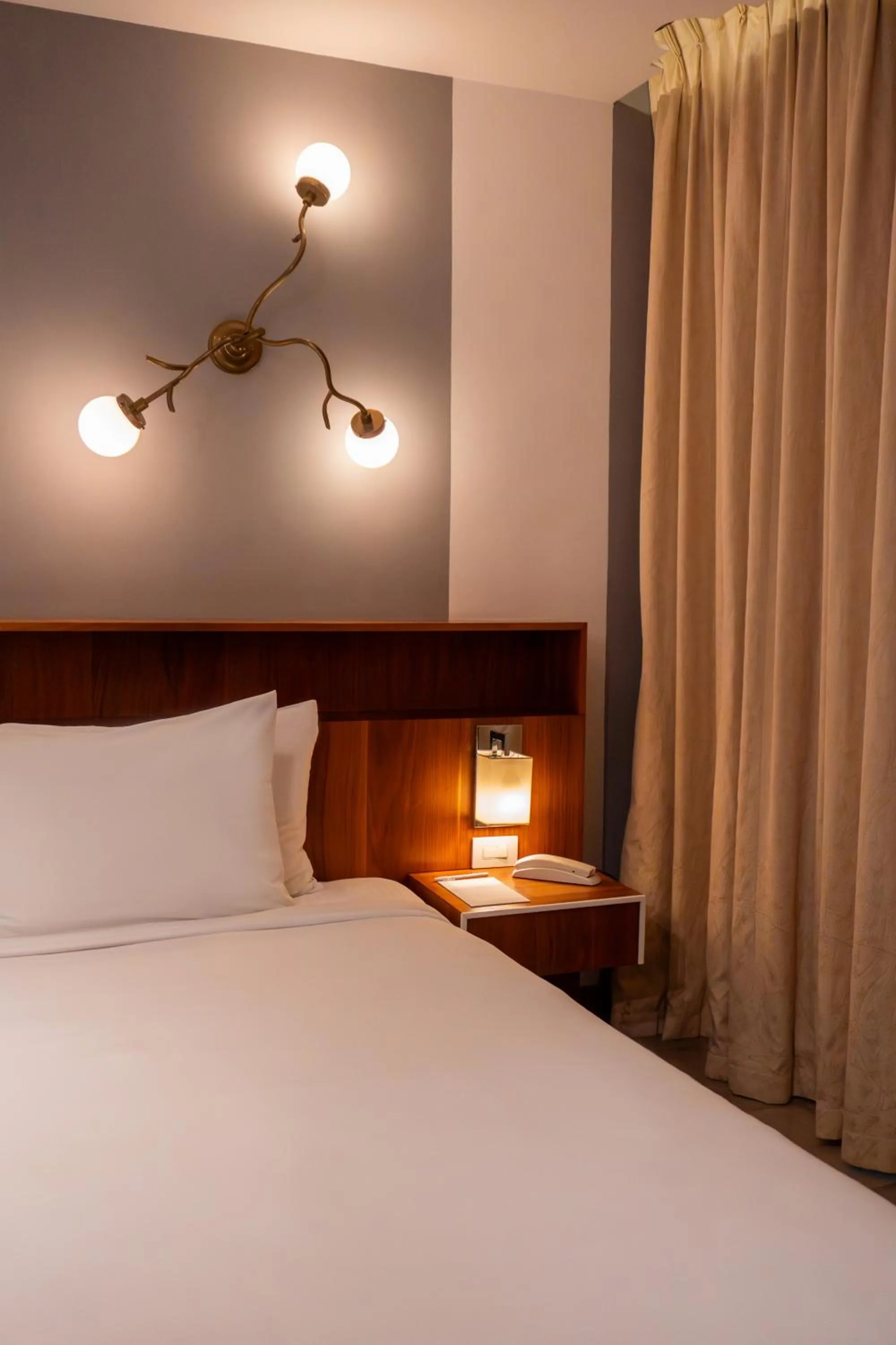 Bed in Flor de Mayo Hotel & Restaurant