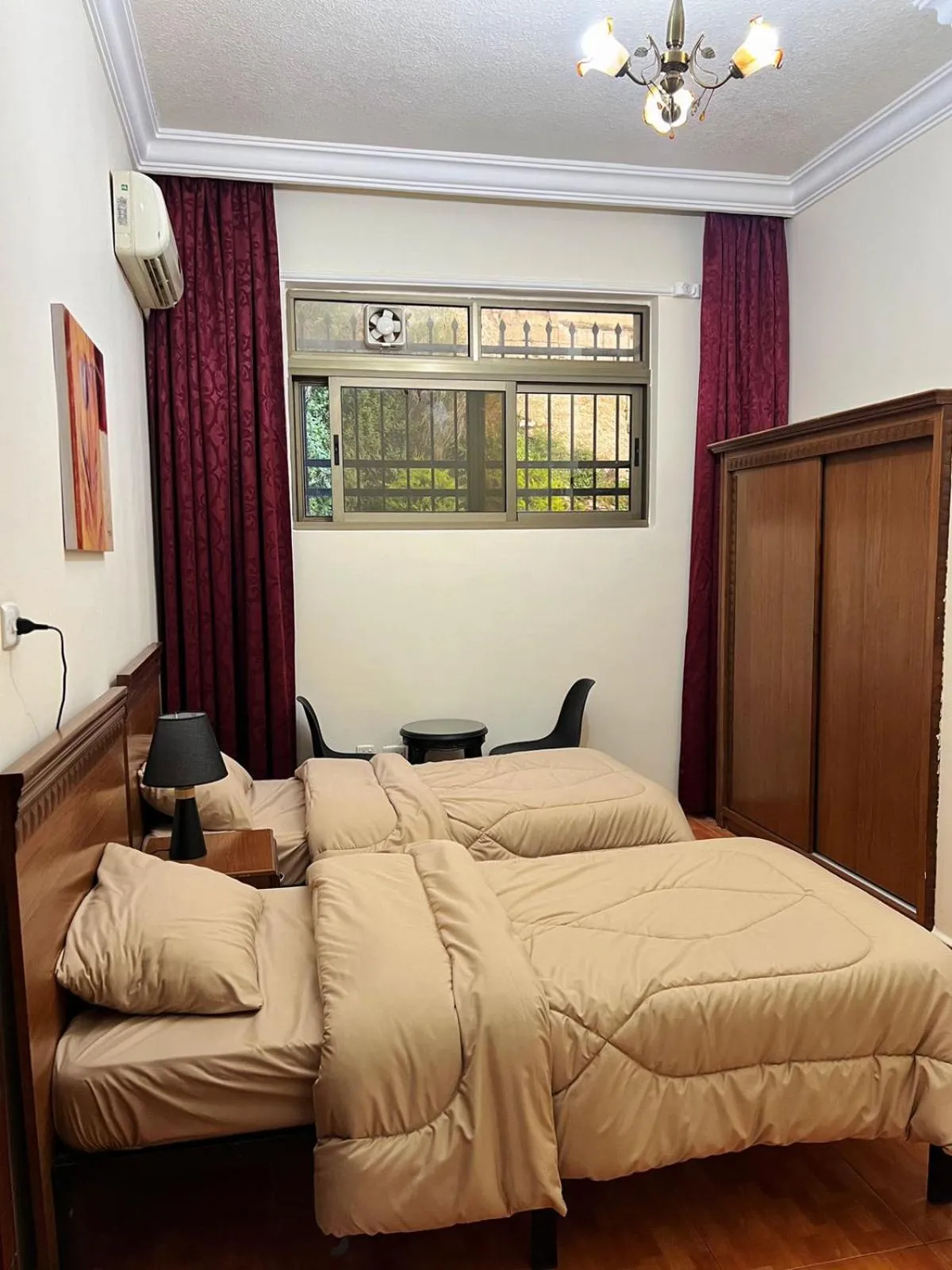 Bed in Sufara Hotel Suites