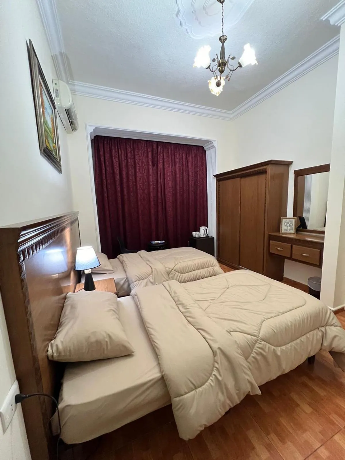 Bed in Sufara Hotel Suites