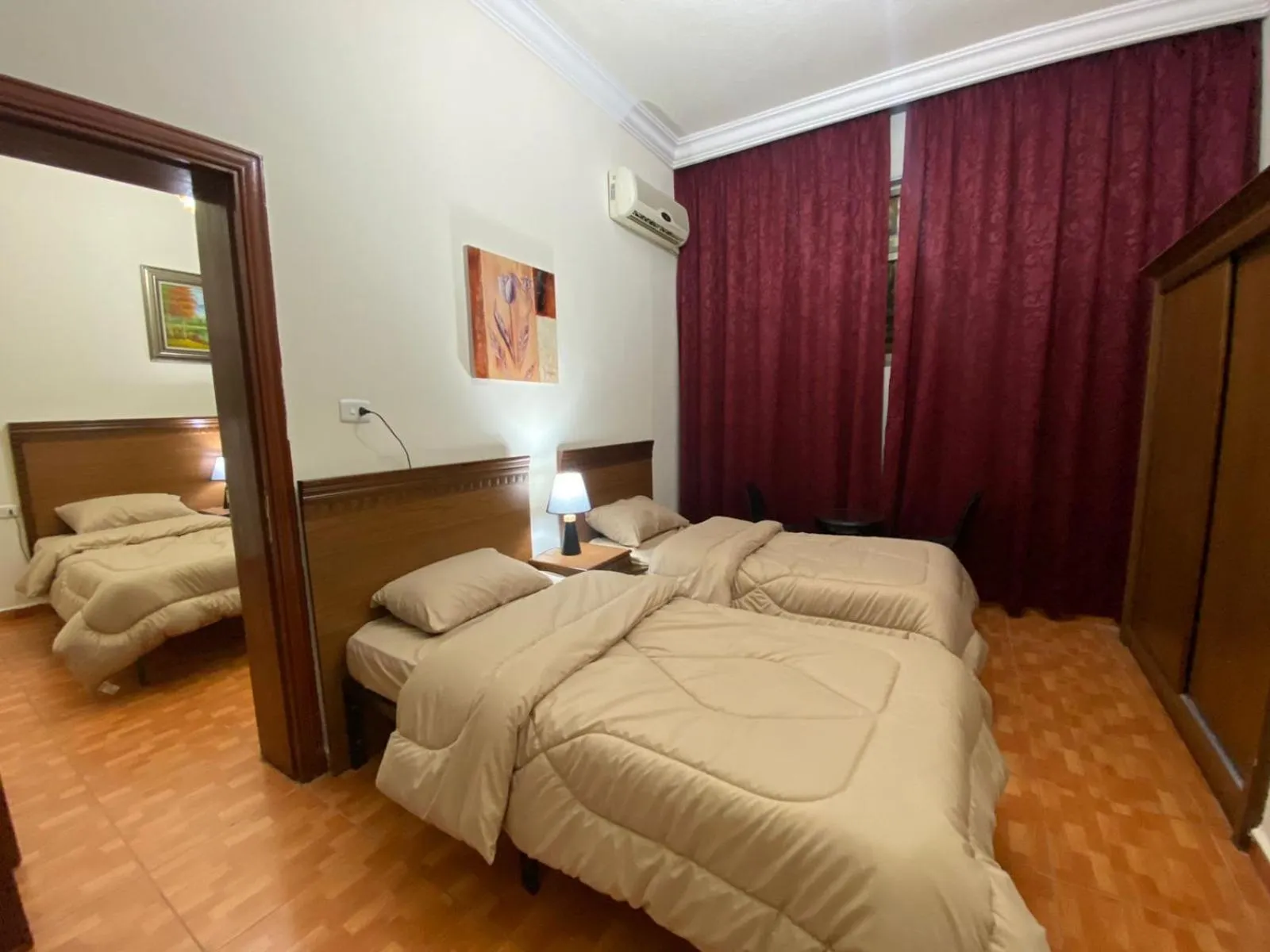 Bed in Sufara Hotel Suites