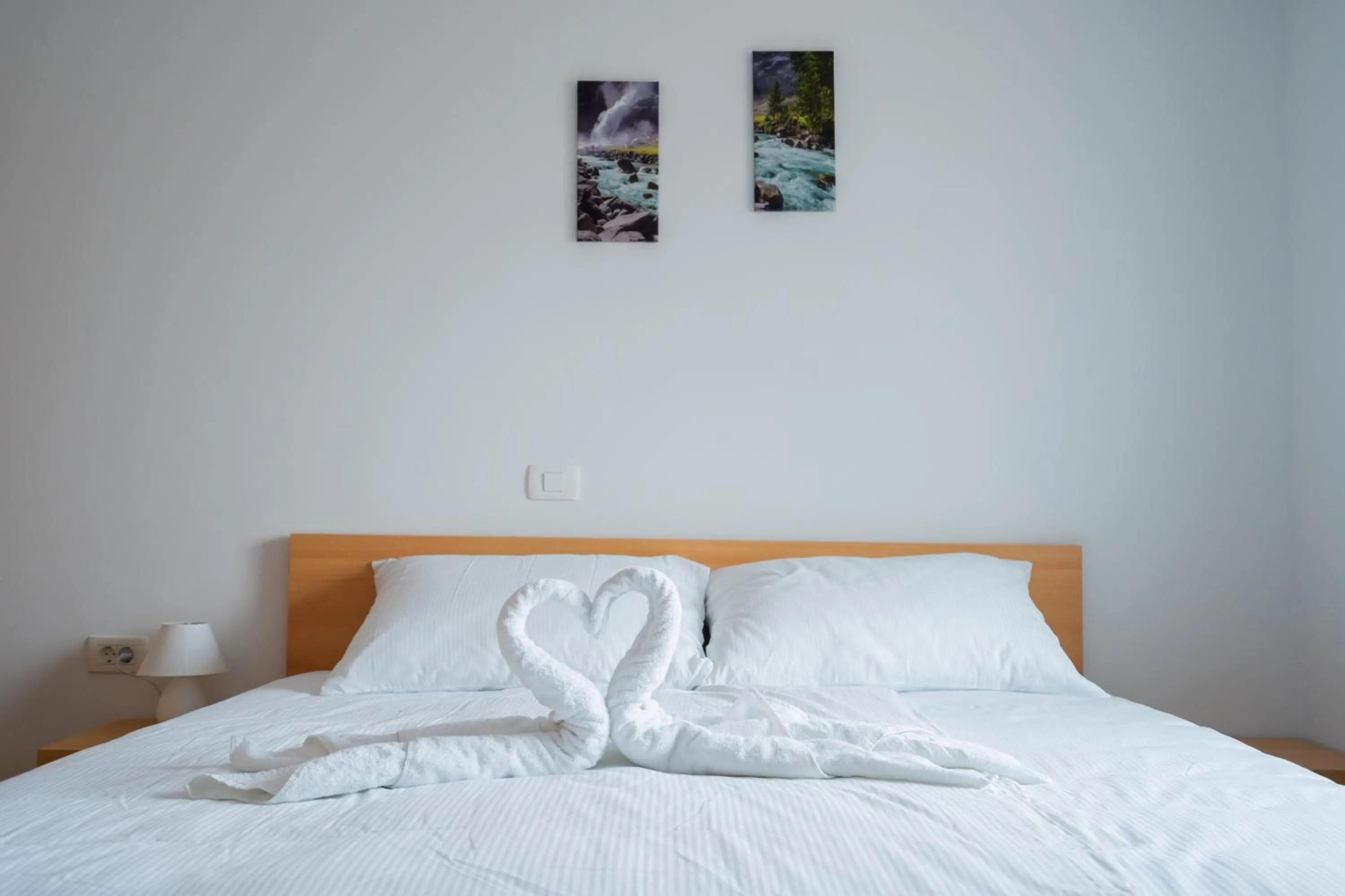 Bed in PJagodic Apartments & Wellness