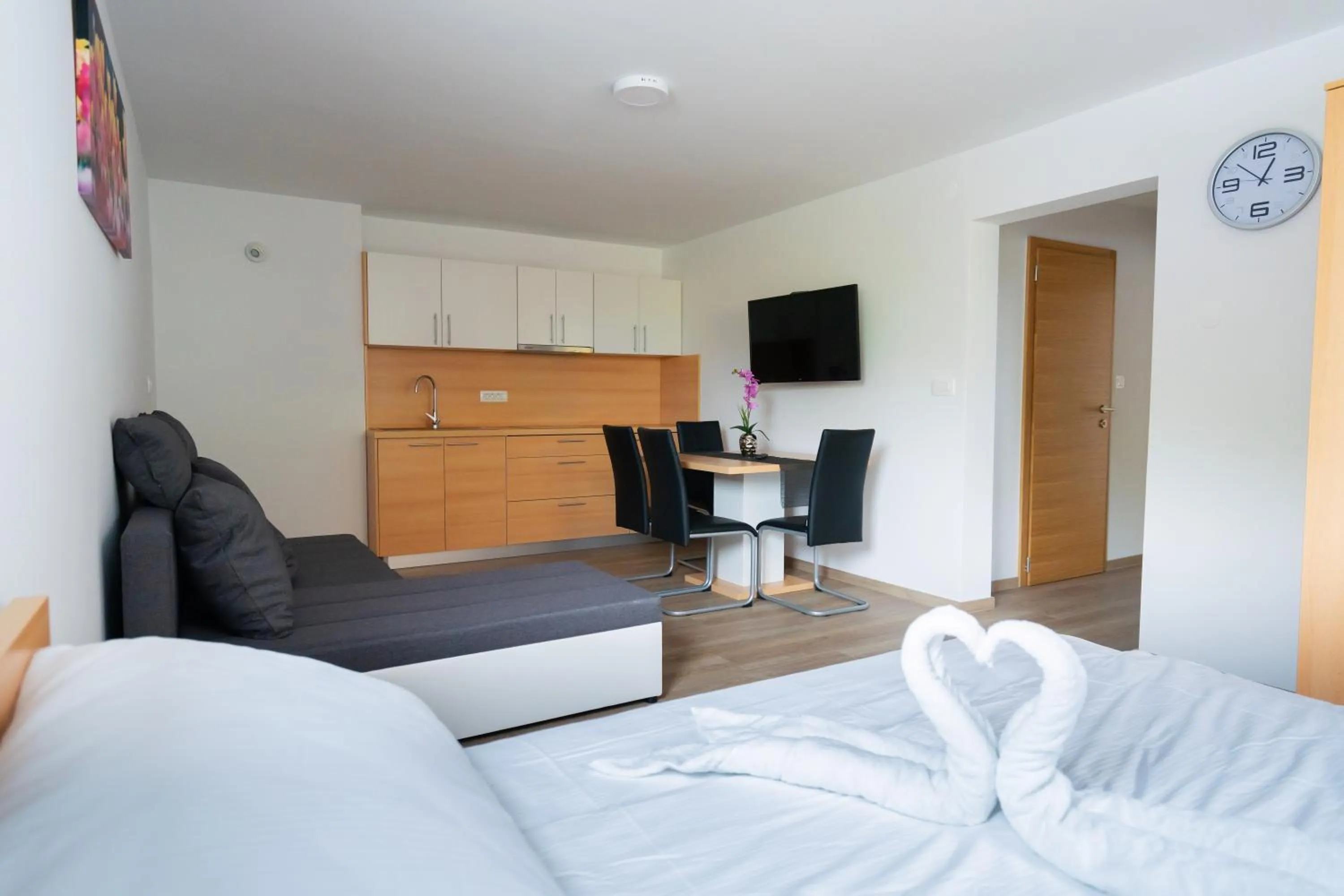 Living room, Bed in PJagodic Apartments & Wellness