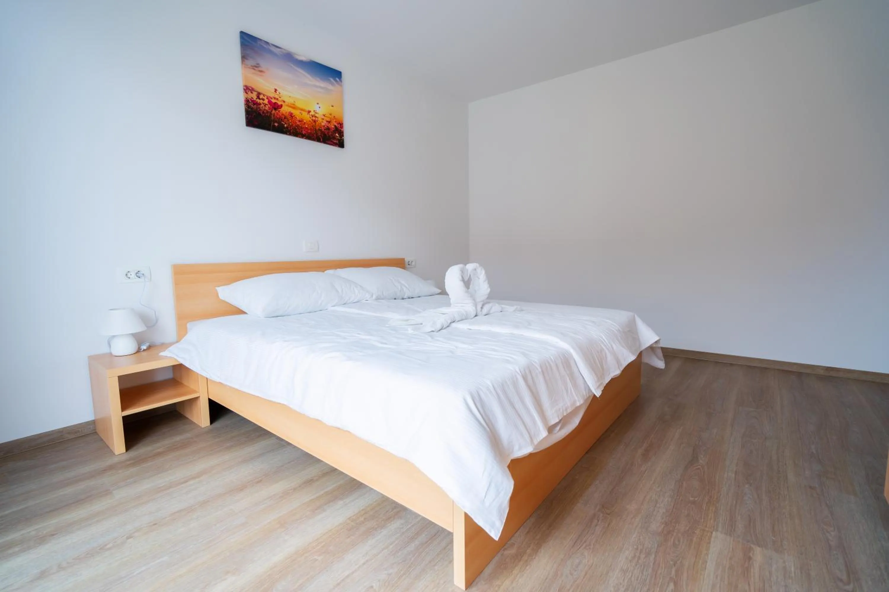 Bed in PJagodic Apartments & Wellness