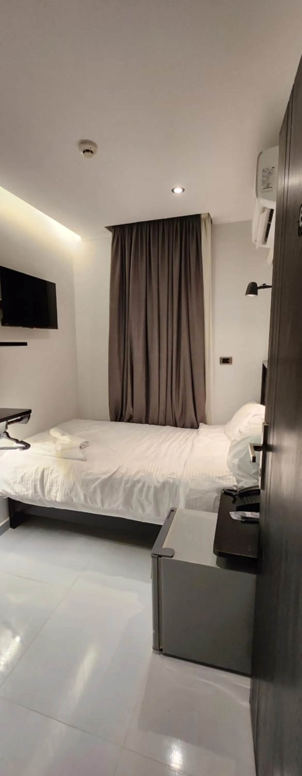 Bed in Helio Cairo Hotel