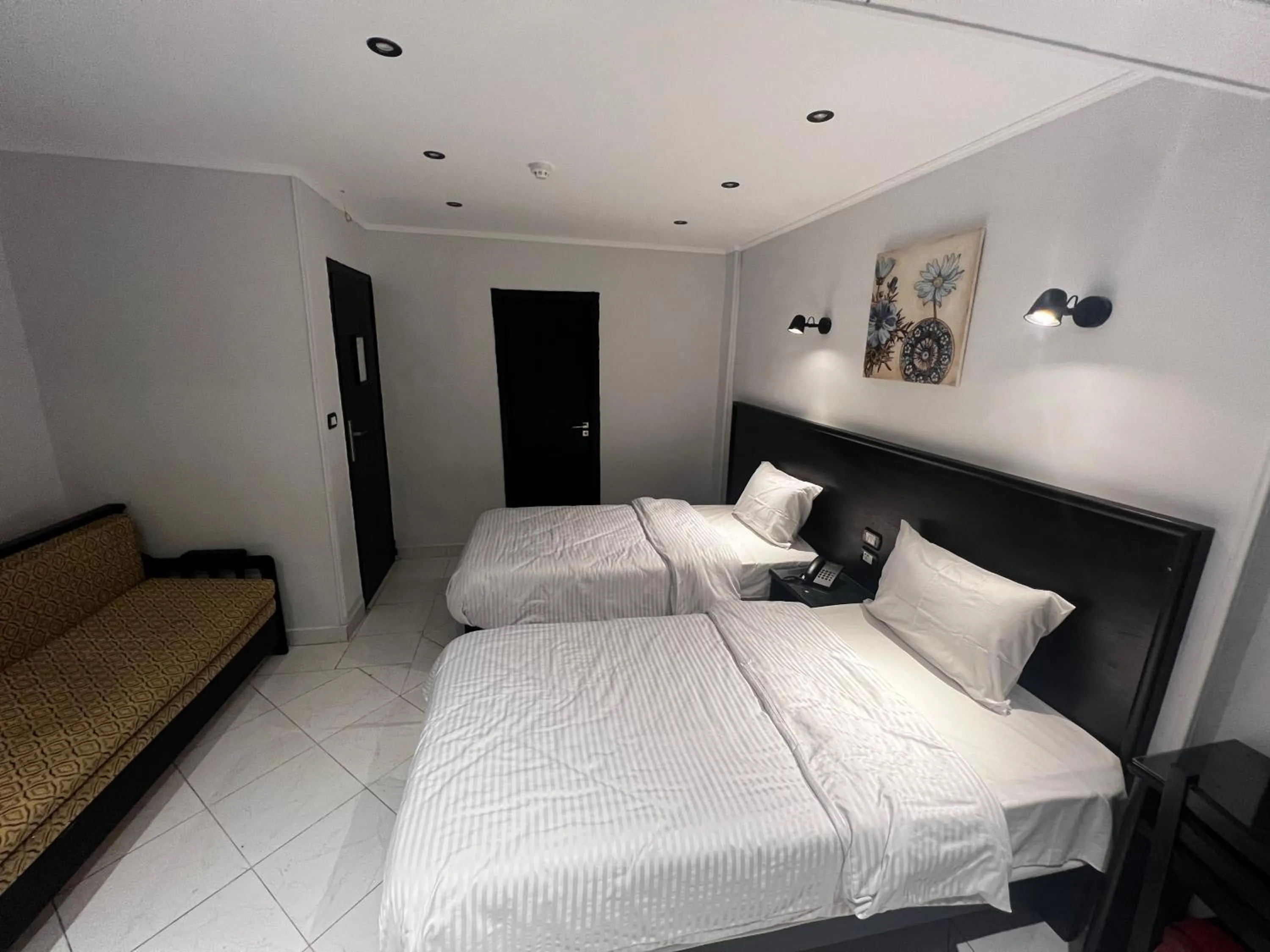 Bed in Helio Cairo Hotel