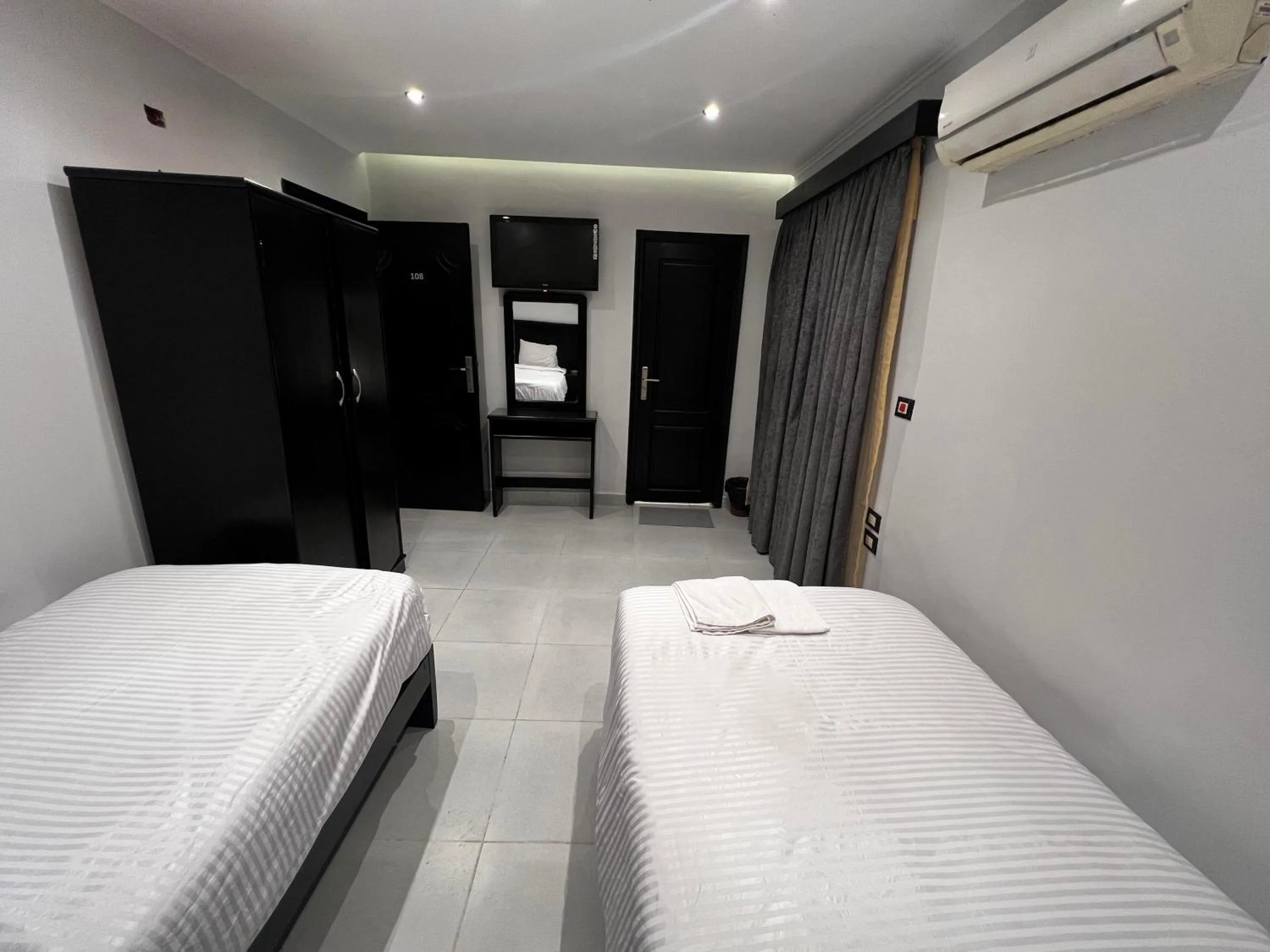 Bed in Helio Cairo Hotel