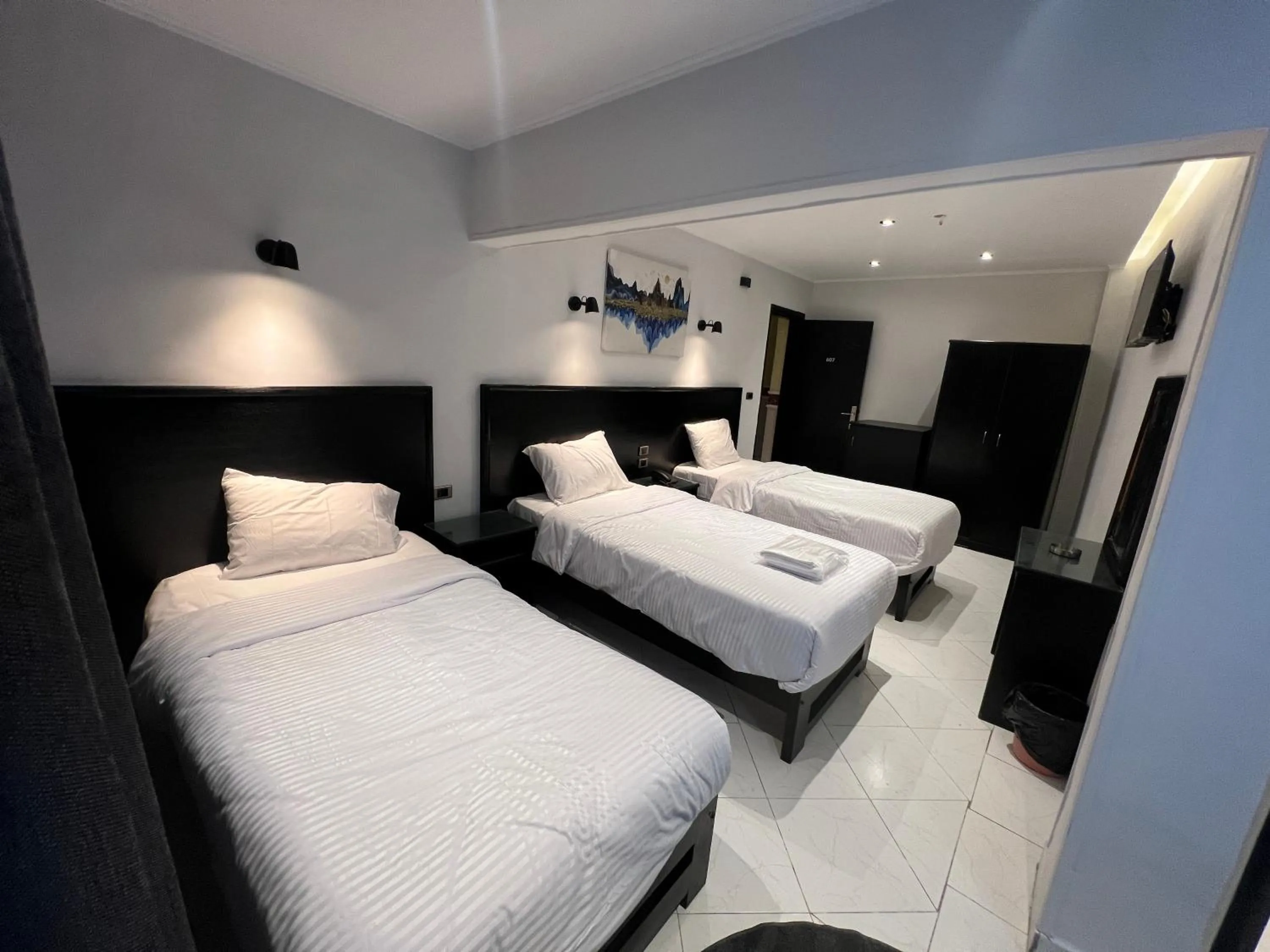 Bed in Helio Cairo Hotel