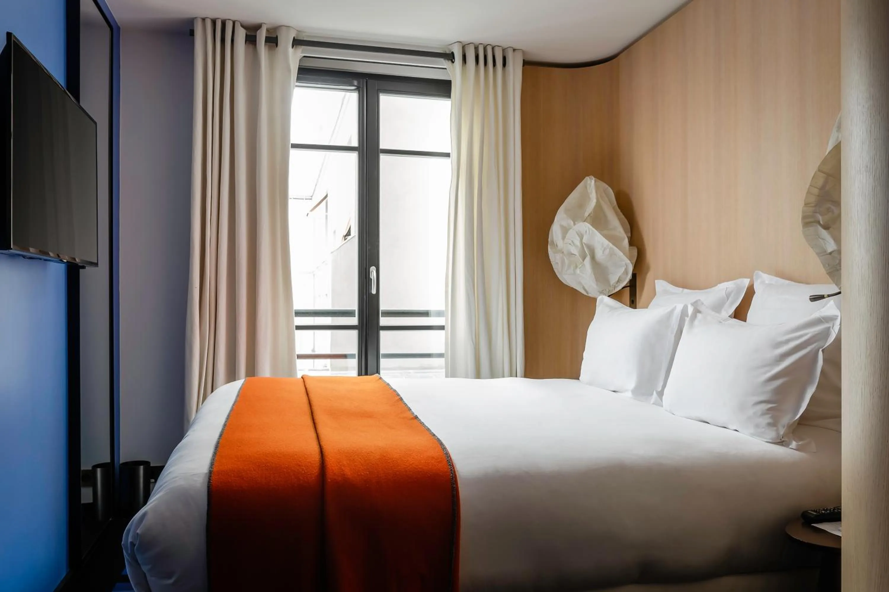 Bed in Hôtel du Ministère