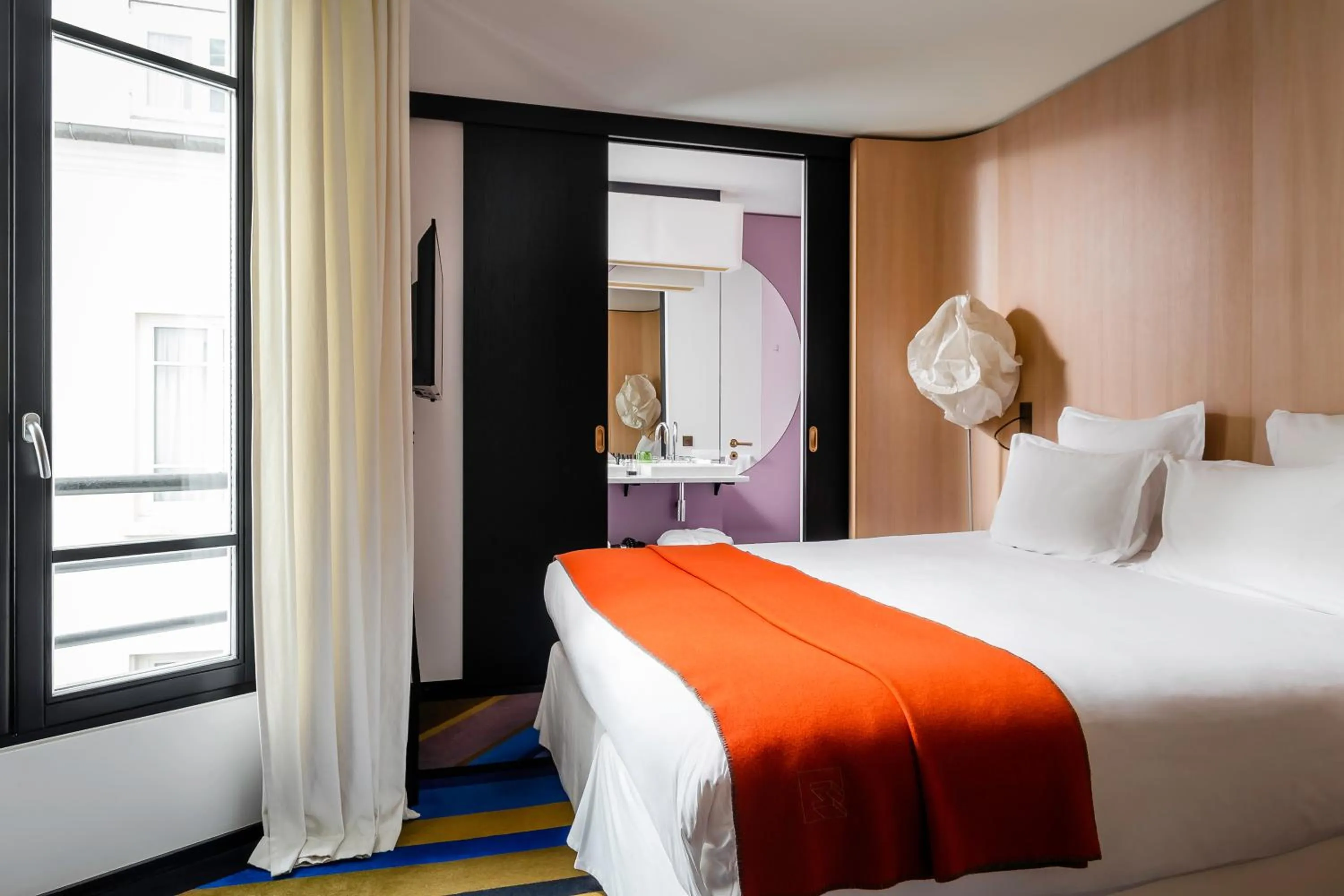 Bed in Hôtel du Ministère