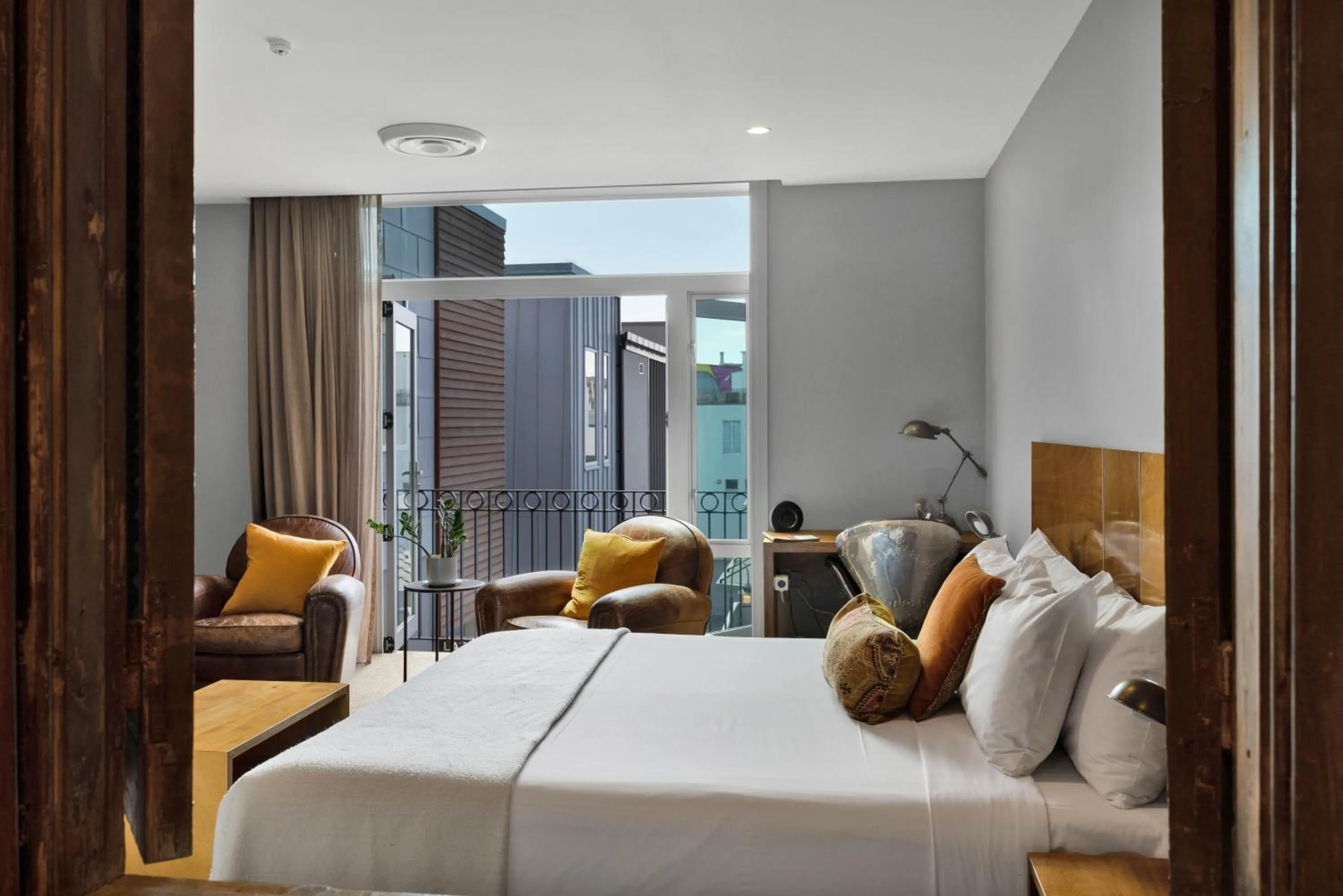 Bed in King and Queen Hotel Suites